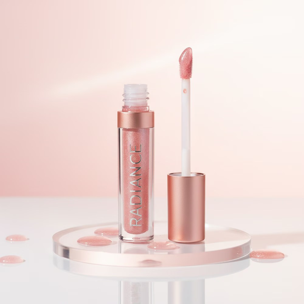Pink lip gloss and applicator displayed in a soft beauty product render