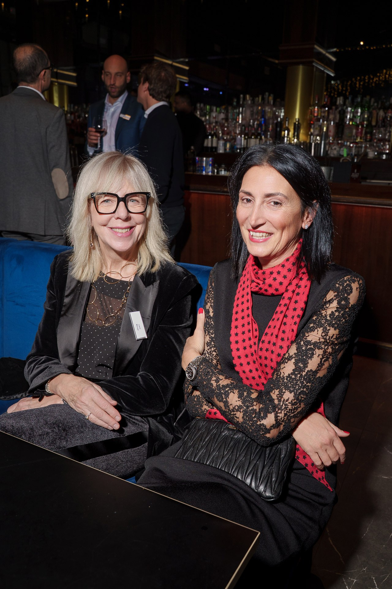 Attendees portrait at a corporate event in Milan, showcasing professional event photography style.