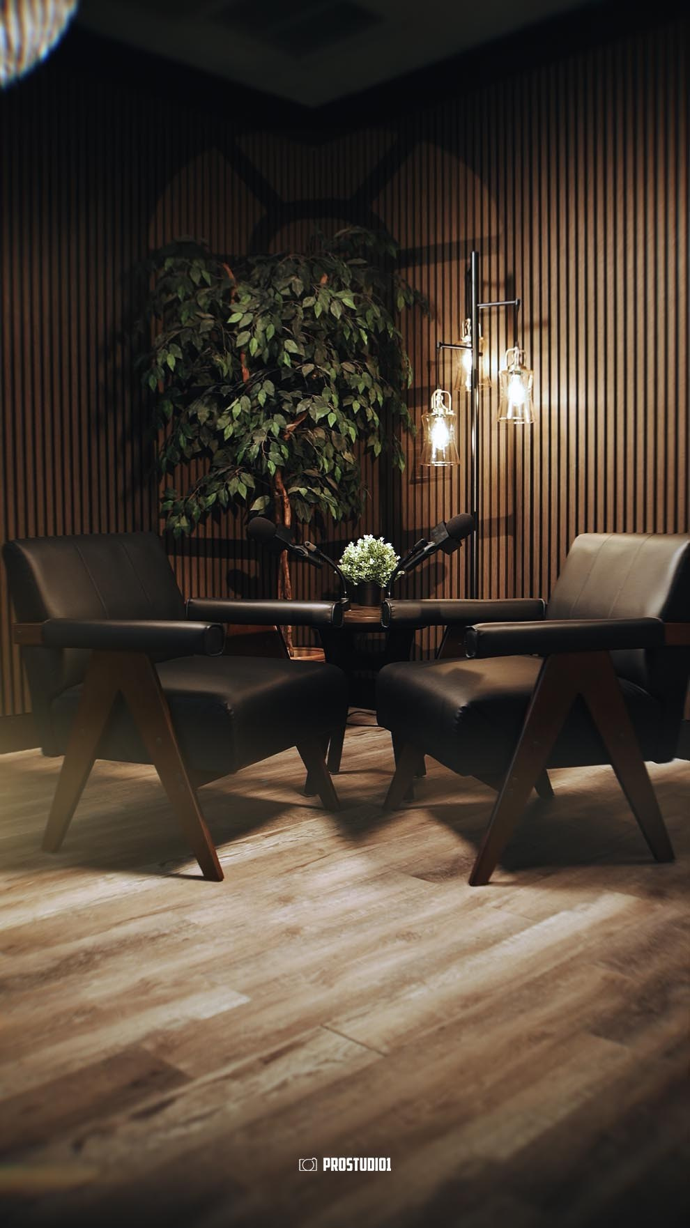 Podcast studio setup with armchair, warm lighting and modern decor at ProStudio1 in Hollywood, FL