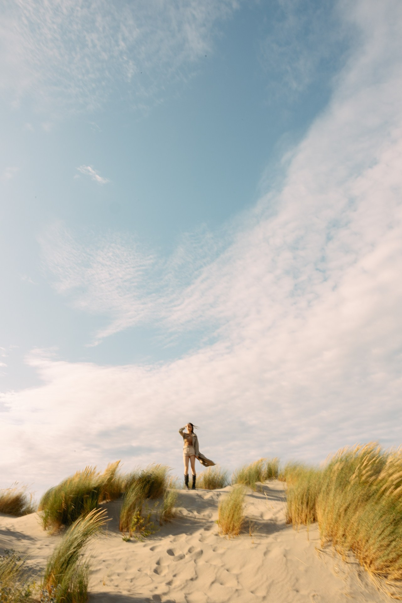 In the Dunes — Portrait Photoshoot on the Dutch Coast. Romantic & Soulful Photography by Natalia Olhova in Rotterdam
