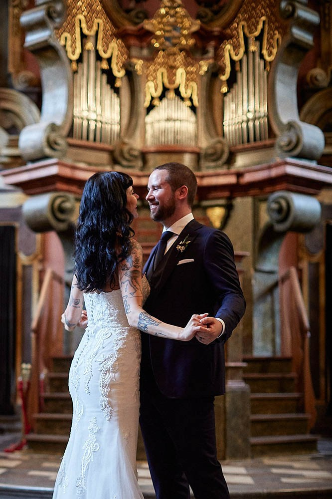 Groom inviting the bride for a spontaneous dance at the Mirror Chapel altar.
