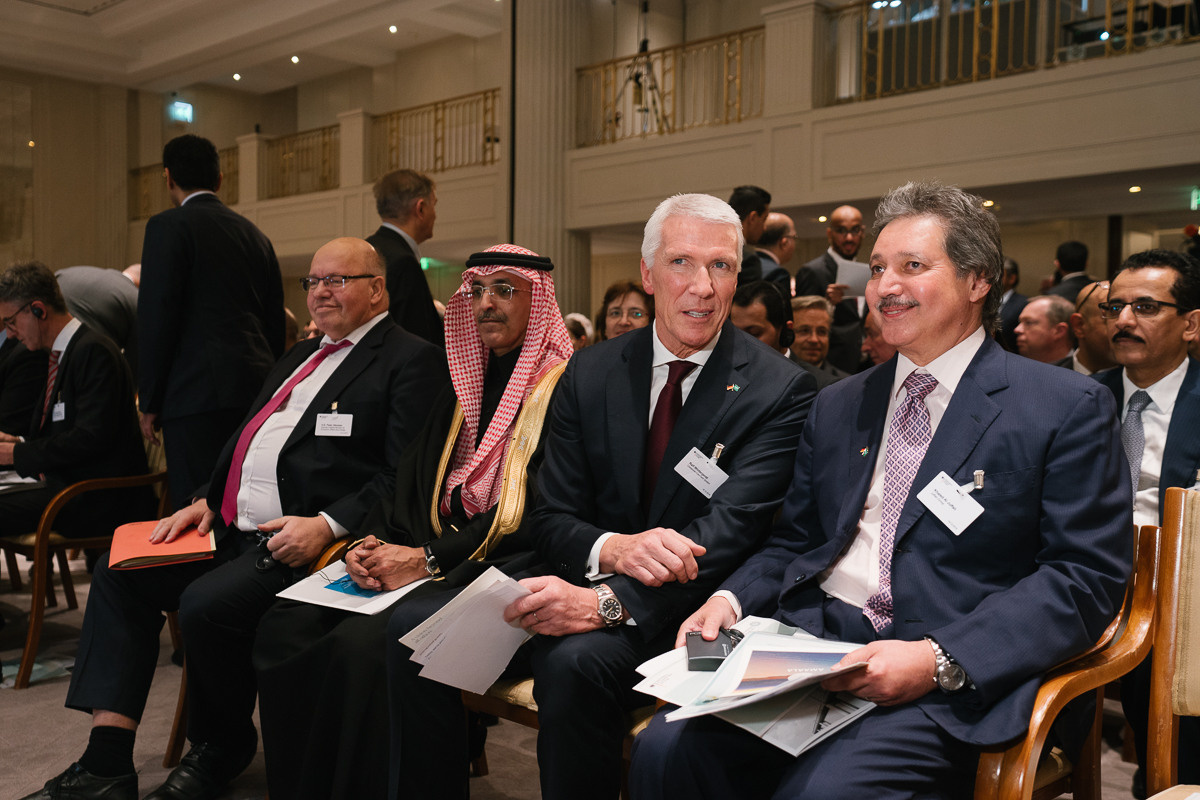Guests sit in the front row before the start of a business forum in Berlin