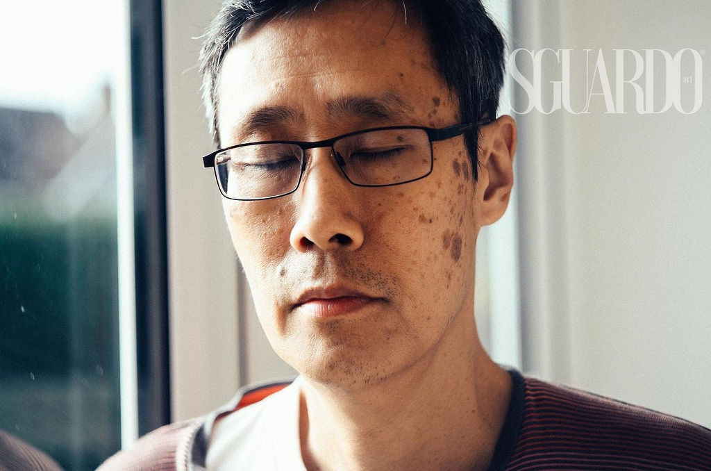 Portrait of a man with closed eyes by the window. SGUARDO Irina Zoteeva, artistic photographer. Lifestyle photographer Solihull and Birmingham.