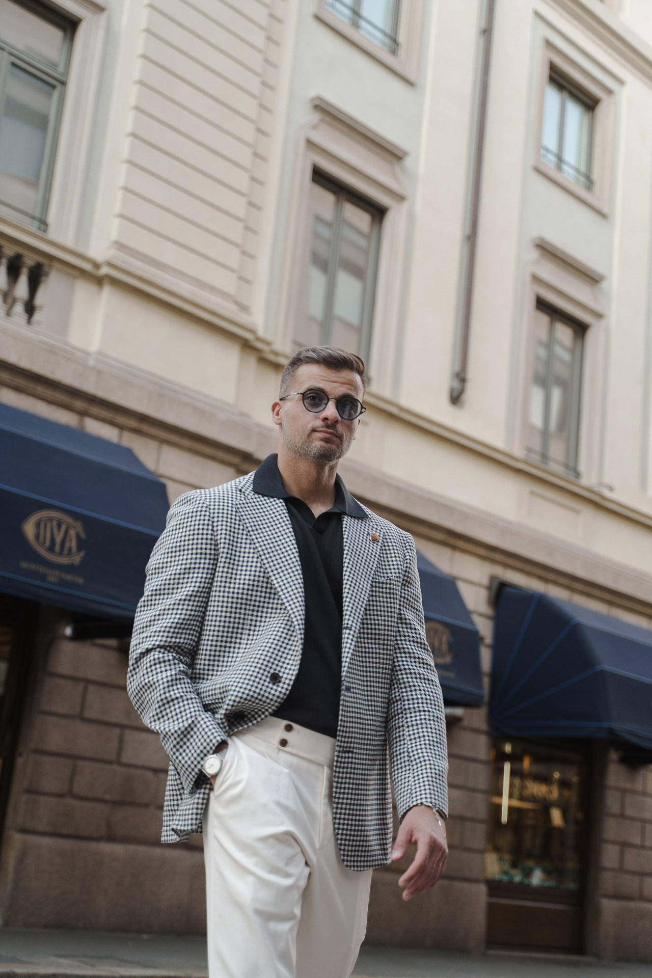 Full-length male portrait with classic architecture in central Milan