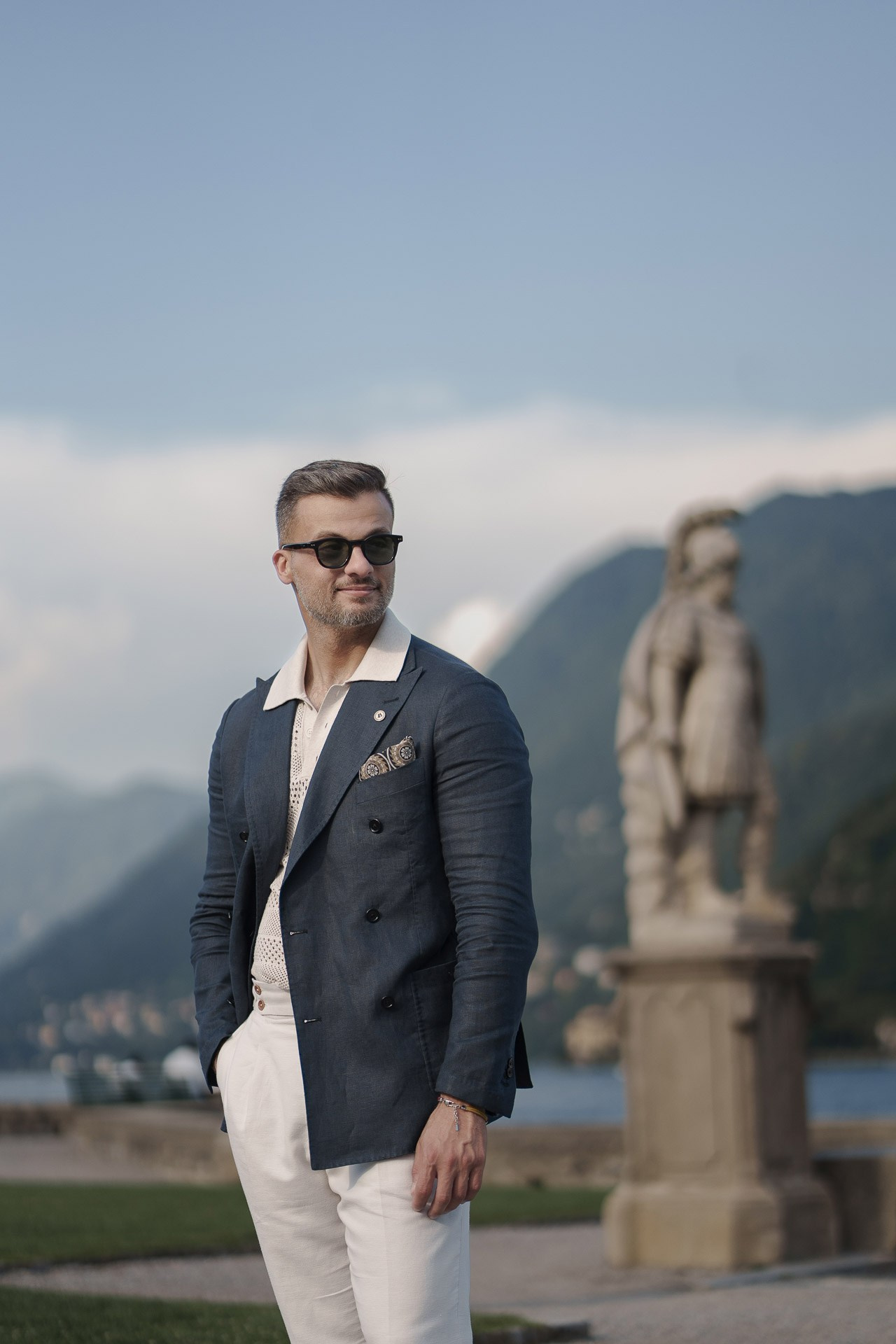 Jamal wearing a navy blazer during a portrait session near Villa Olmo