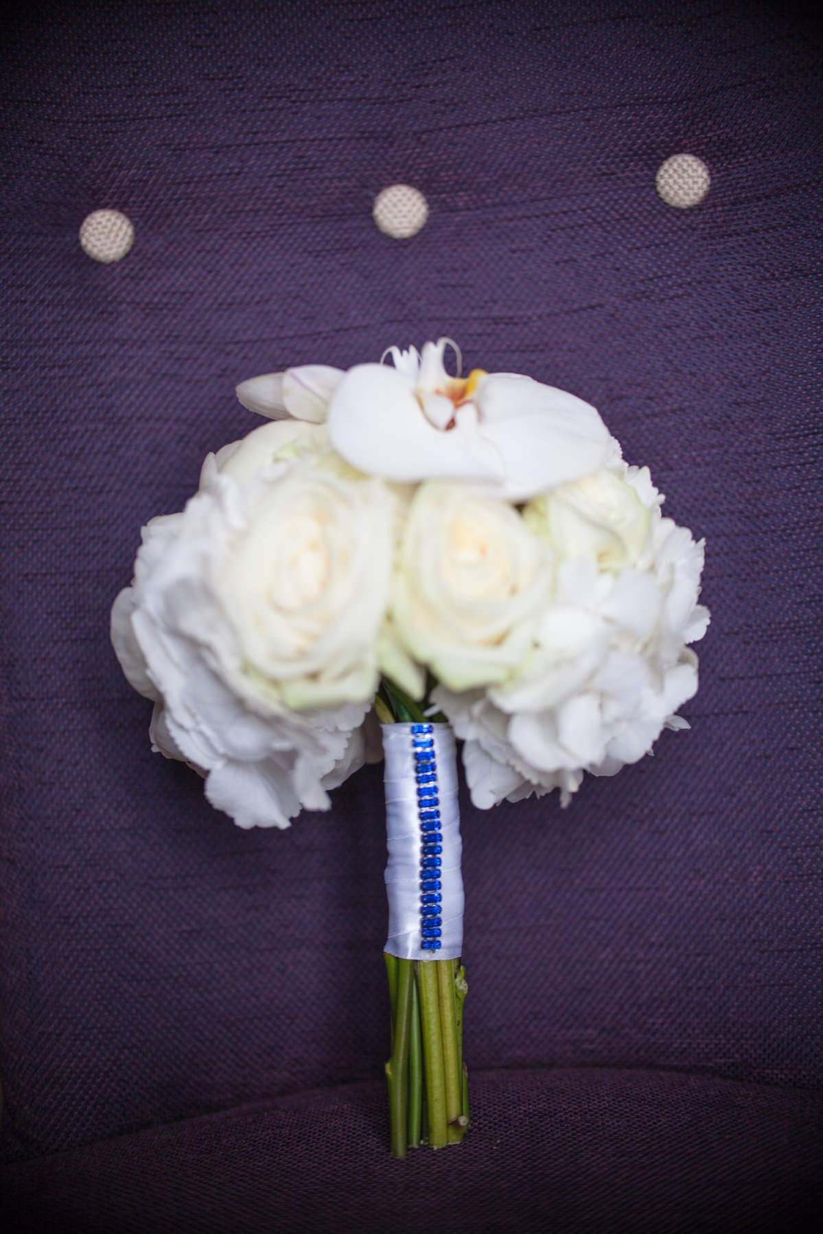 Delicate white rose bridal bouquet for Swiss bride Julia's Prague wedding