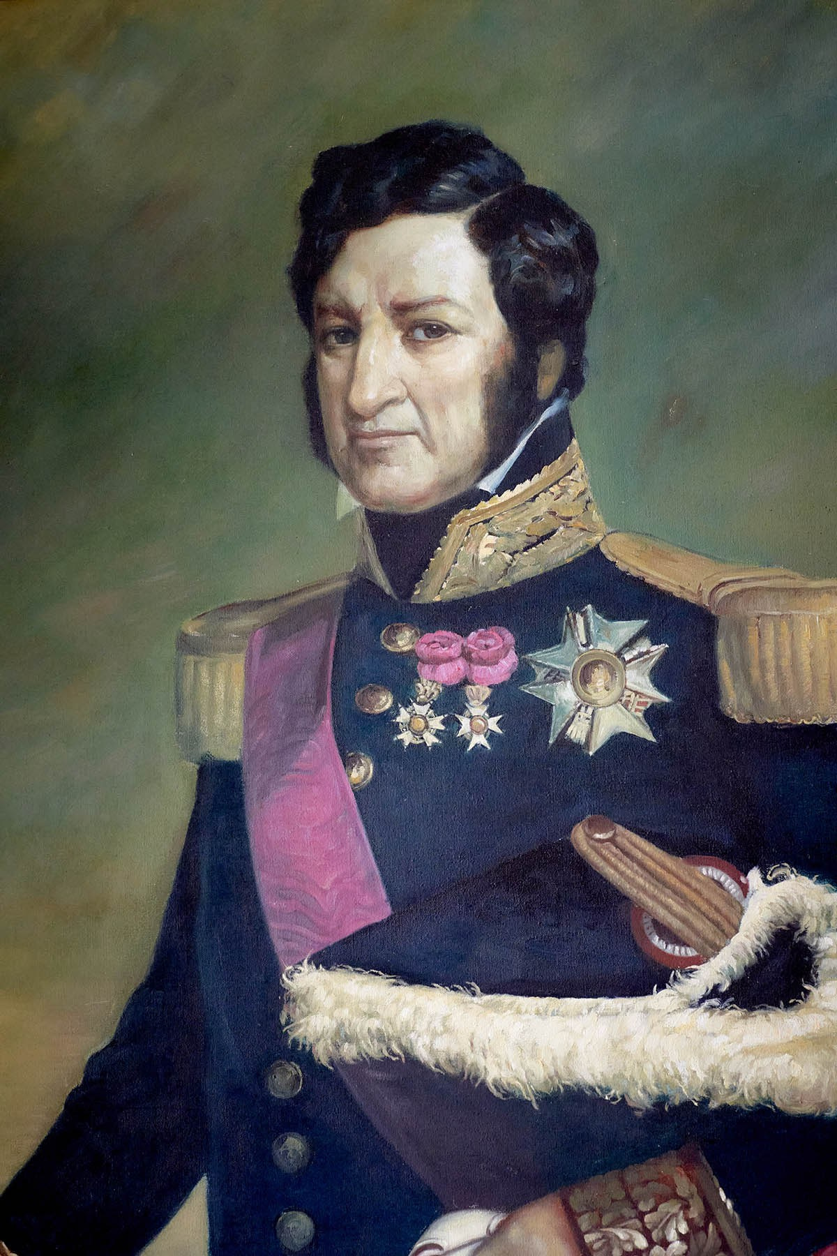 Overlooking the opulent suite, a portrait of Prince Ferdinand hangs.