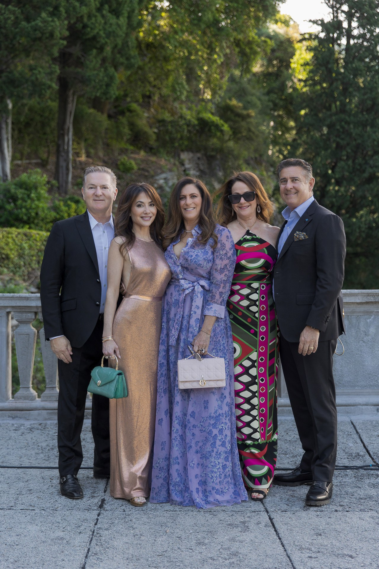 Group portrait of guests at a formal event in Northern Italy, showcasing elegant event photography.