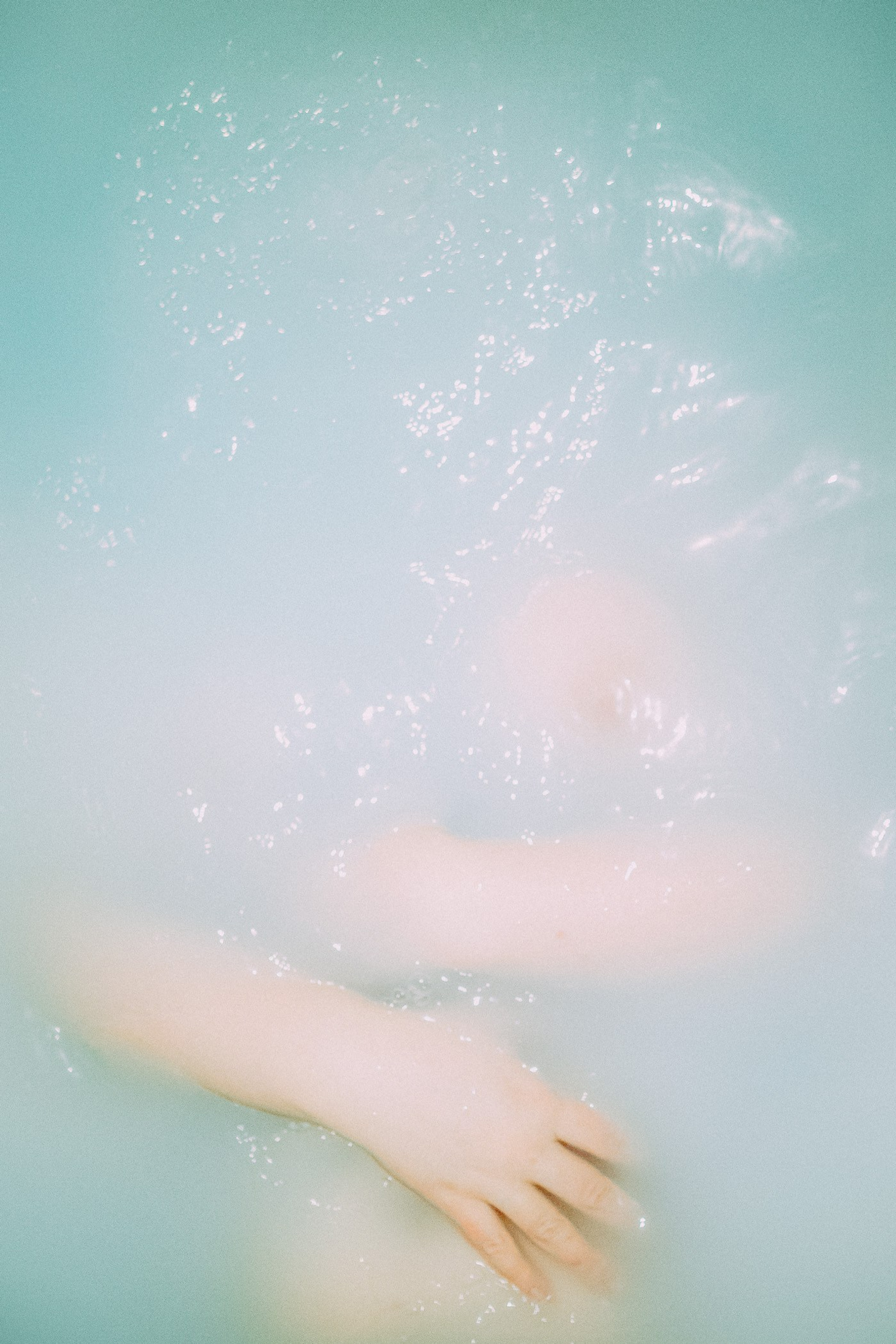 Surreal Serenity explores the female body in water — a poetic meditation on femininity, strength, and stillness