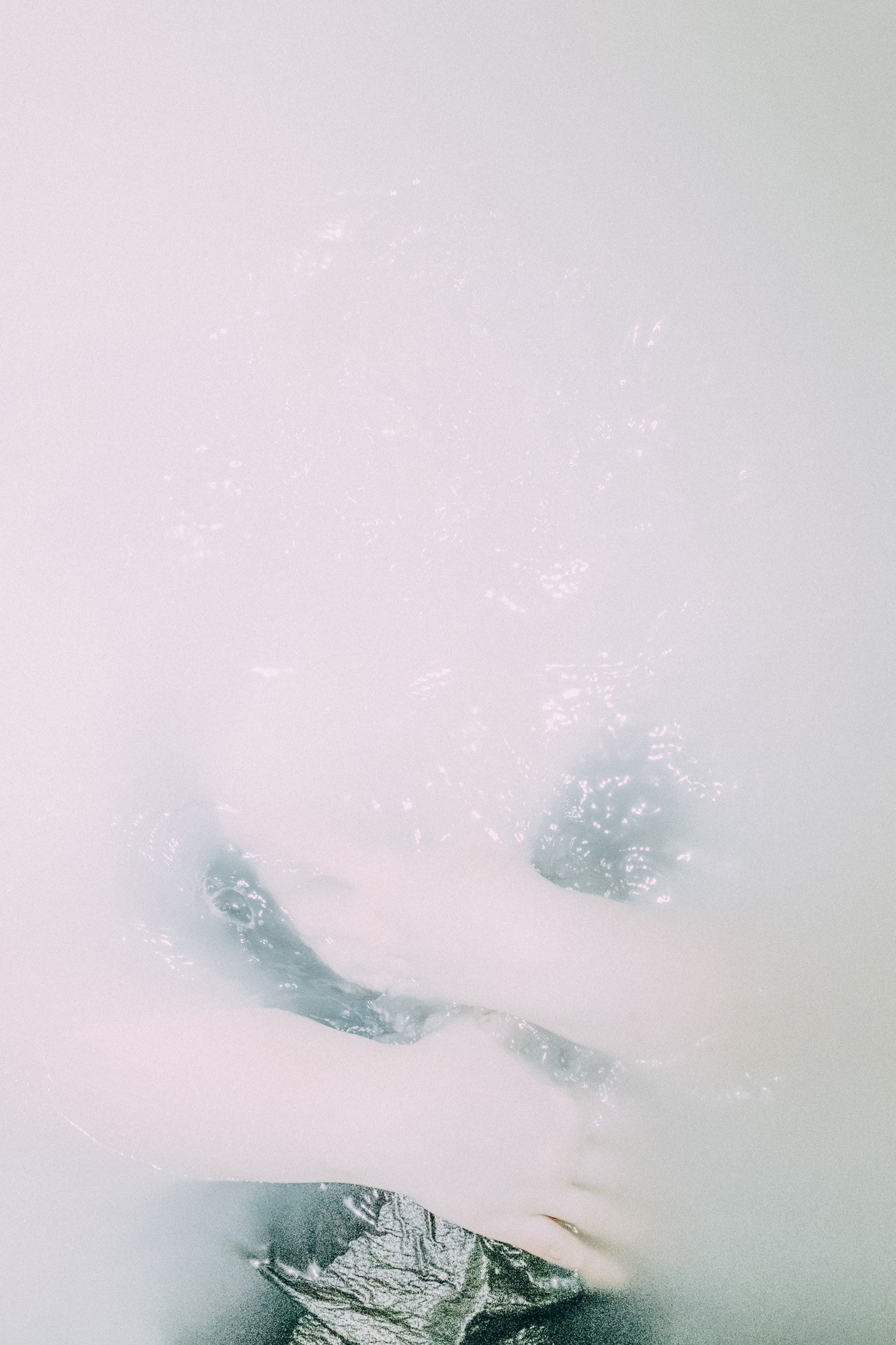 Surreal Serenity explores the female body in water — a poetic meditation on femininity, strength, and stillness