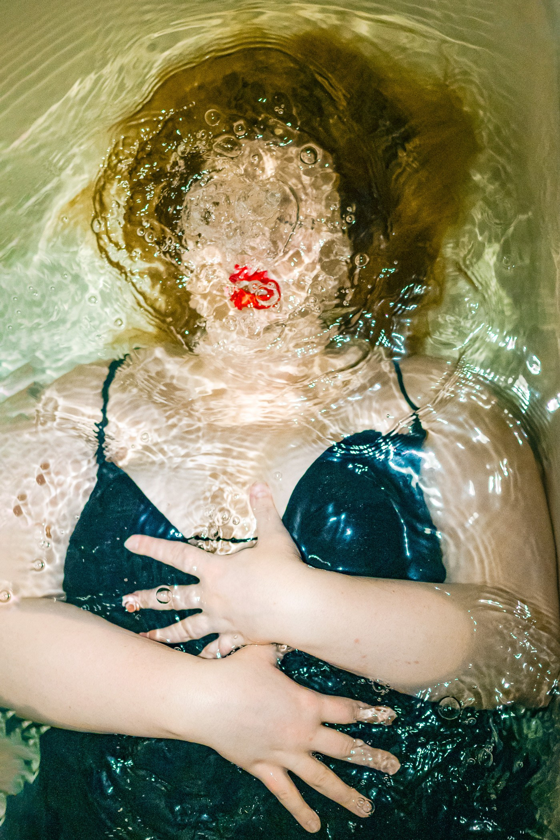 Surreal Serenity explores the female body in water — a poetic meditation on femininity, strength, and stillness