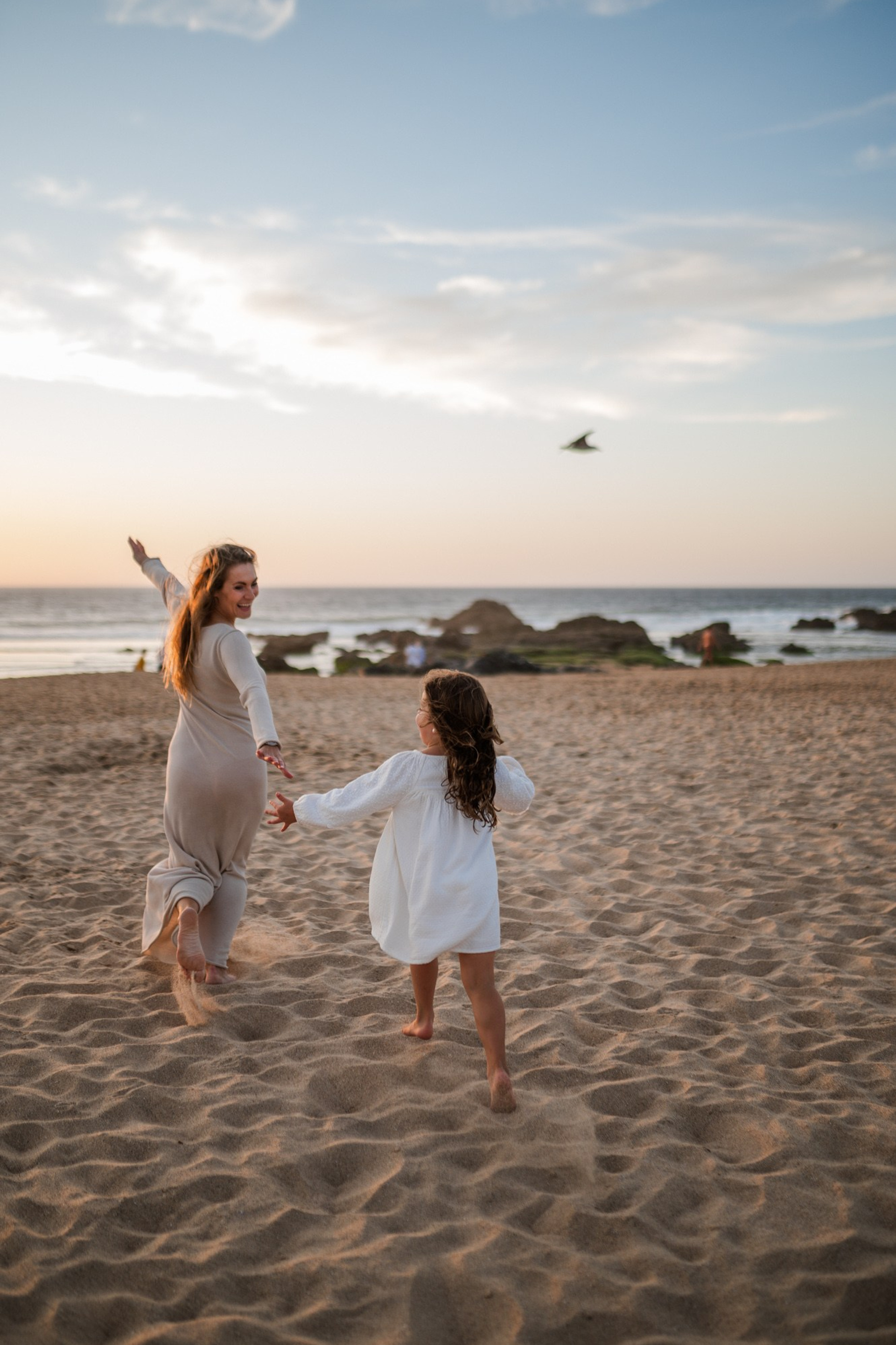 Sessão de fotos de família na praia