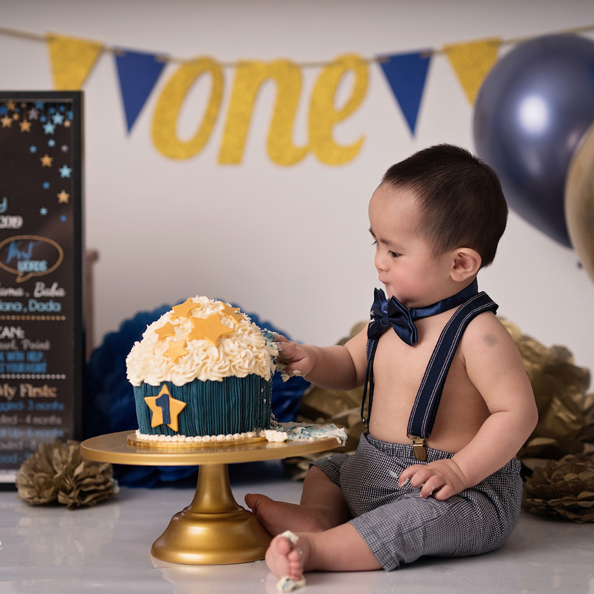 Peter rabbit cake smash for one-year-old baby. Newborn and family photographer. Hills District. Sydney