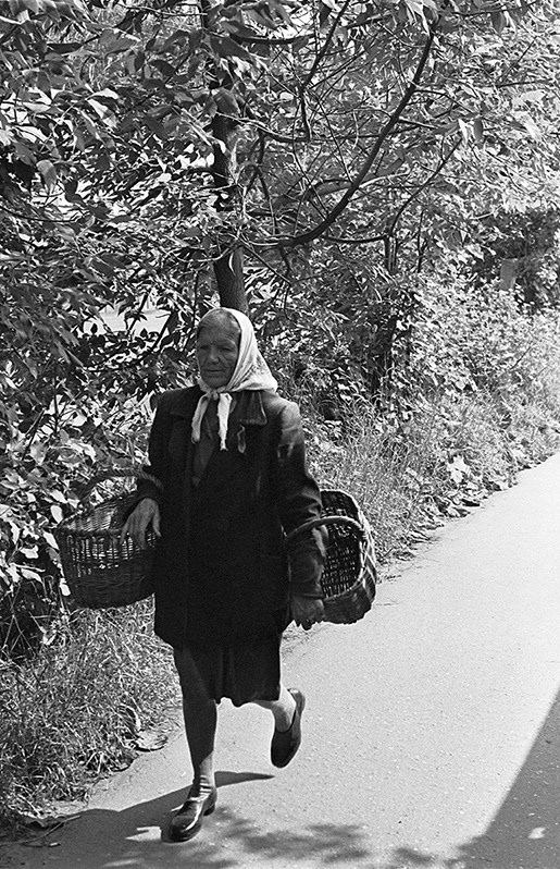 Woman with baskets, Rostov, Yaroslavl region, Russian SFSR. July 1983