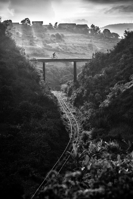 Village, bridge and railway, near Sahambavy, Lalangina district, Haute Matsiatra region, Fianarantsoa province, Republic of Madagascar. 2017