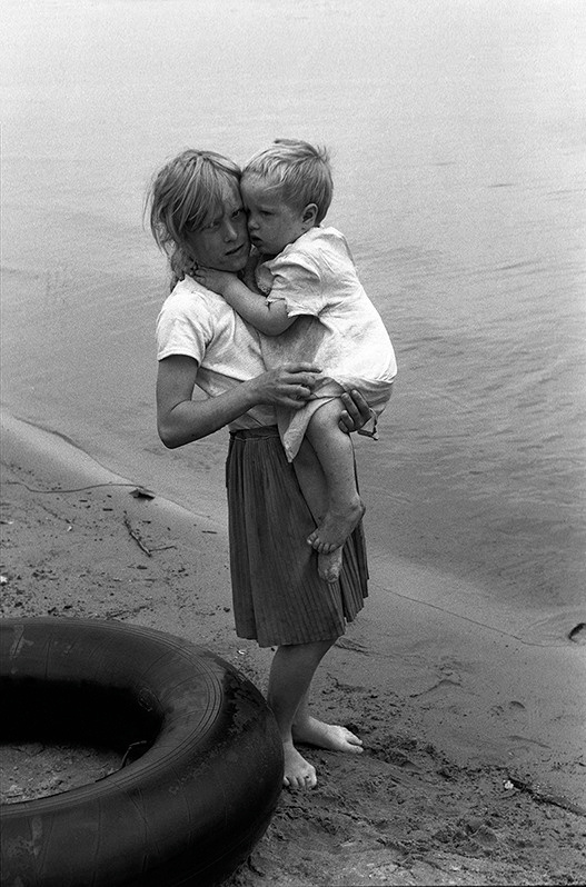 Two sisters on the bank of the lake Kenozero, near Vershinino village, Plesetsky district, Arkhangelsk region, Russian SFSR. July 1990