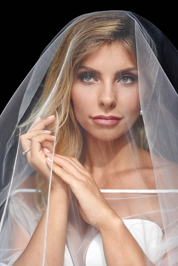 Bridal portrait under veil — editorial wedding photography Dubai and destination