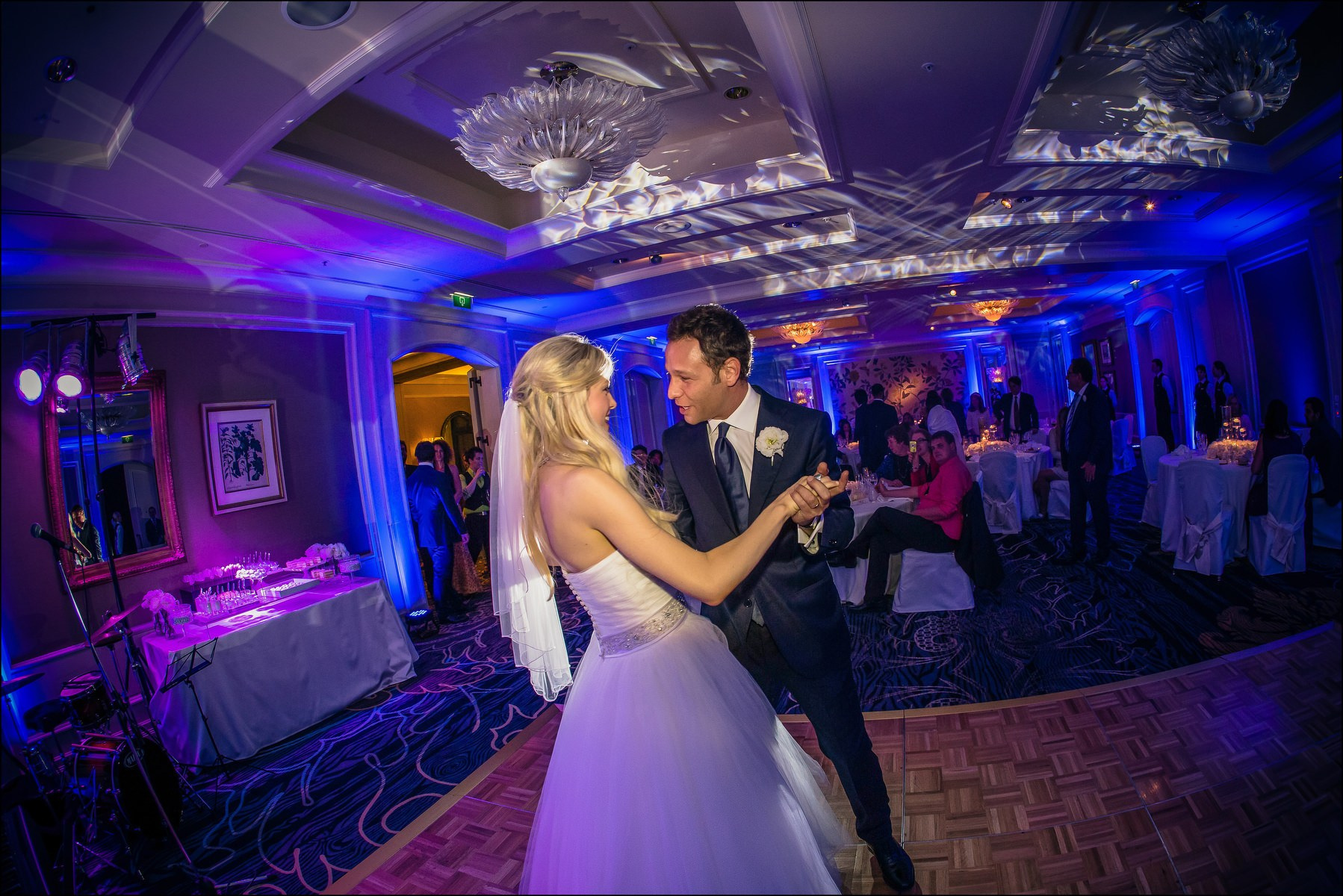 Bride and groom gazing lovingly during first dance Prague reception