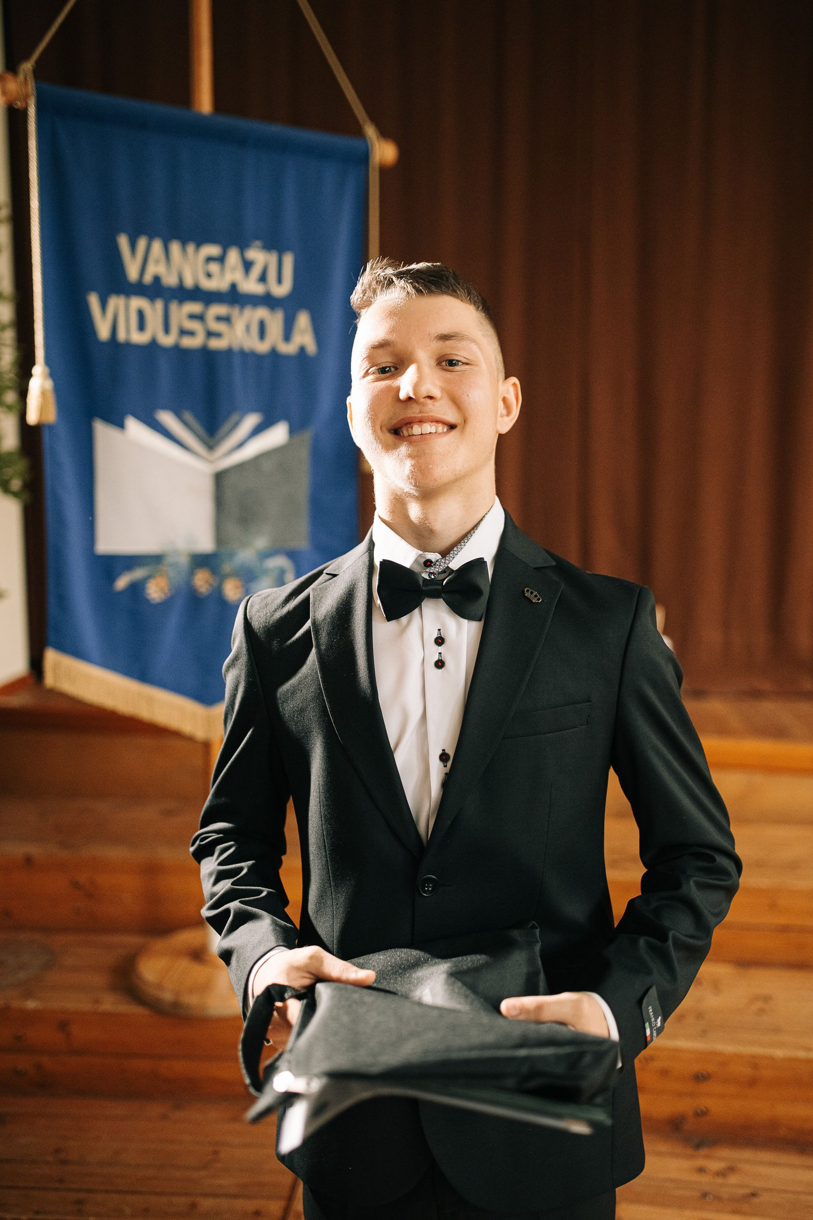 Skolas izlaiduma fotogrāfs