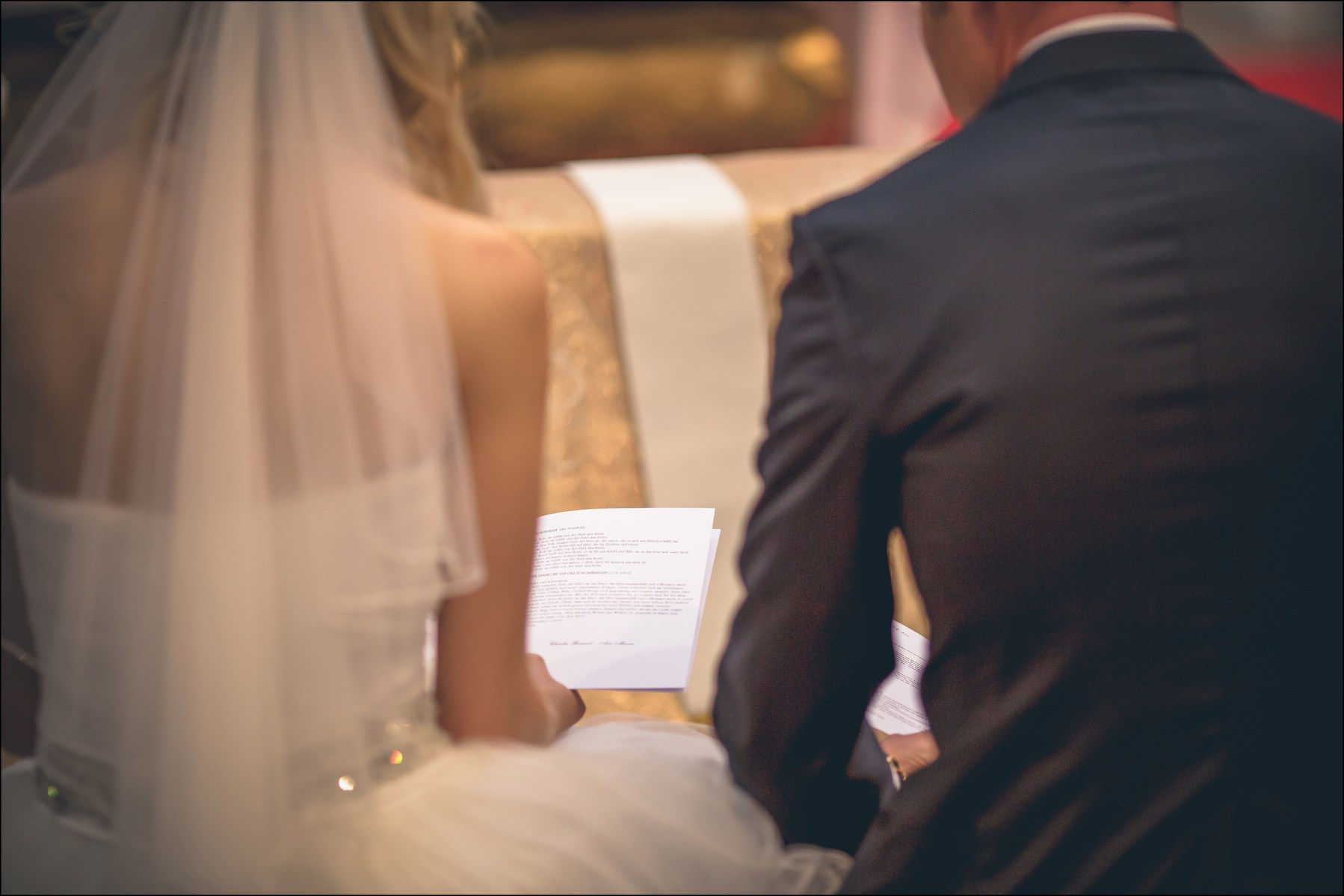Bride and groom sharing quiet vows at St. Thomas Church wedding Prague