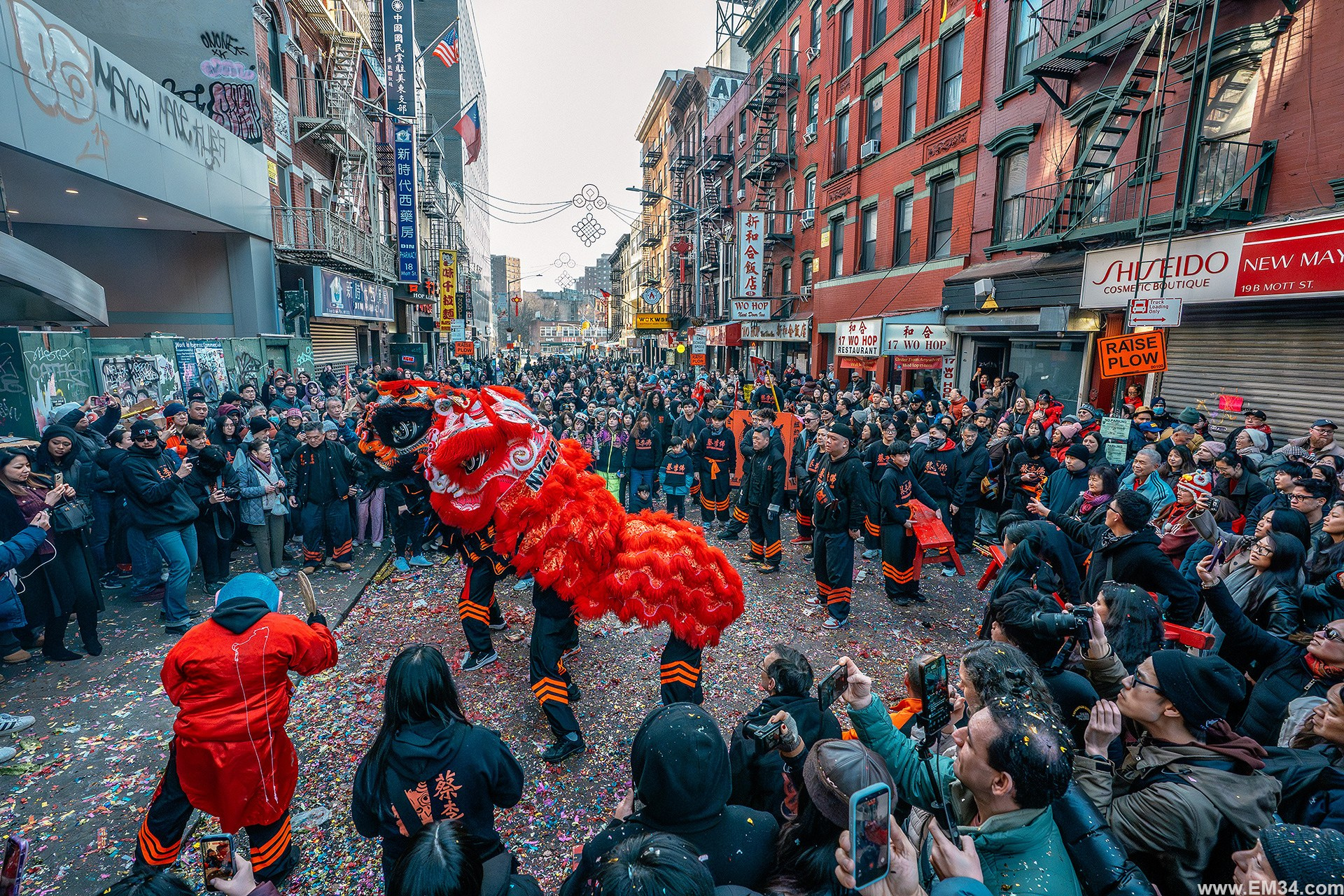 Lunar New Year Chinatown Street Photography — Chaotic NYC Festival Captured in One Hour of Firecrackers, Color & Energy. Emin Kuliyev — Award-Winning Wedding Photojournalist NYC & USA | Best Wedding Photographer Known for Candid, Timeless Moments
