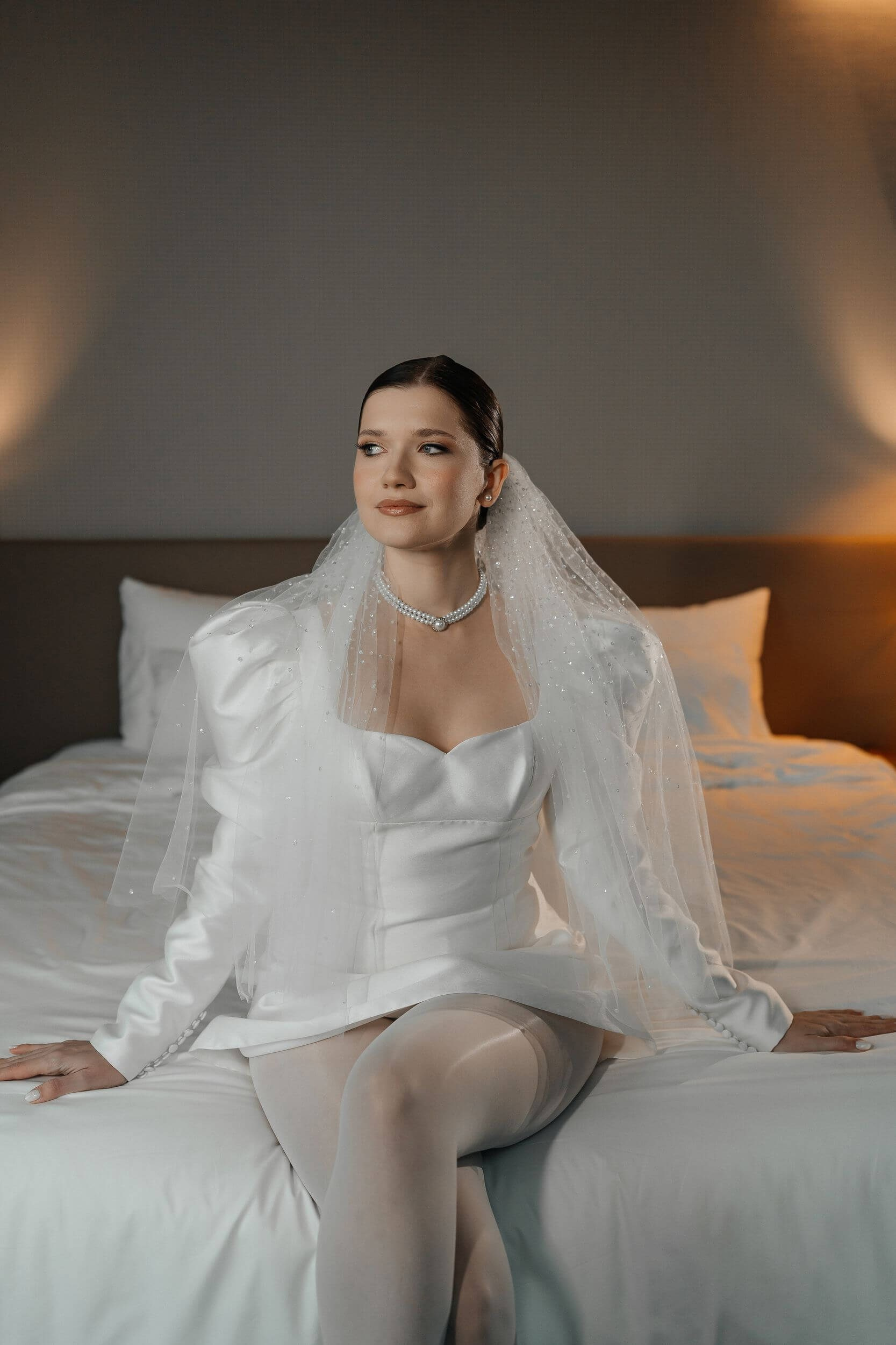 bride portrait at the bed