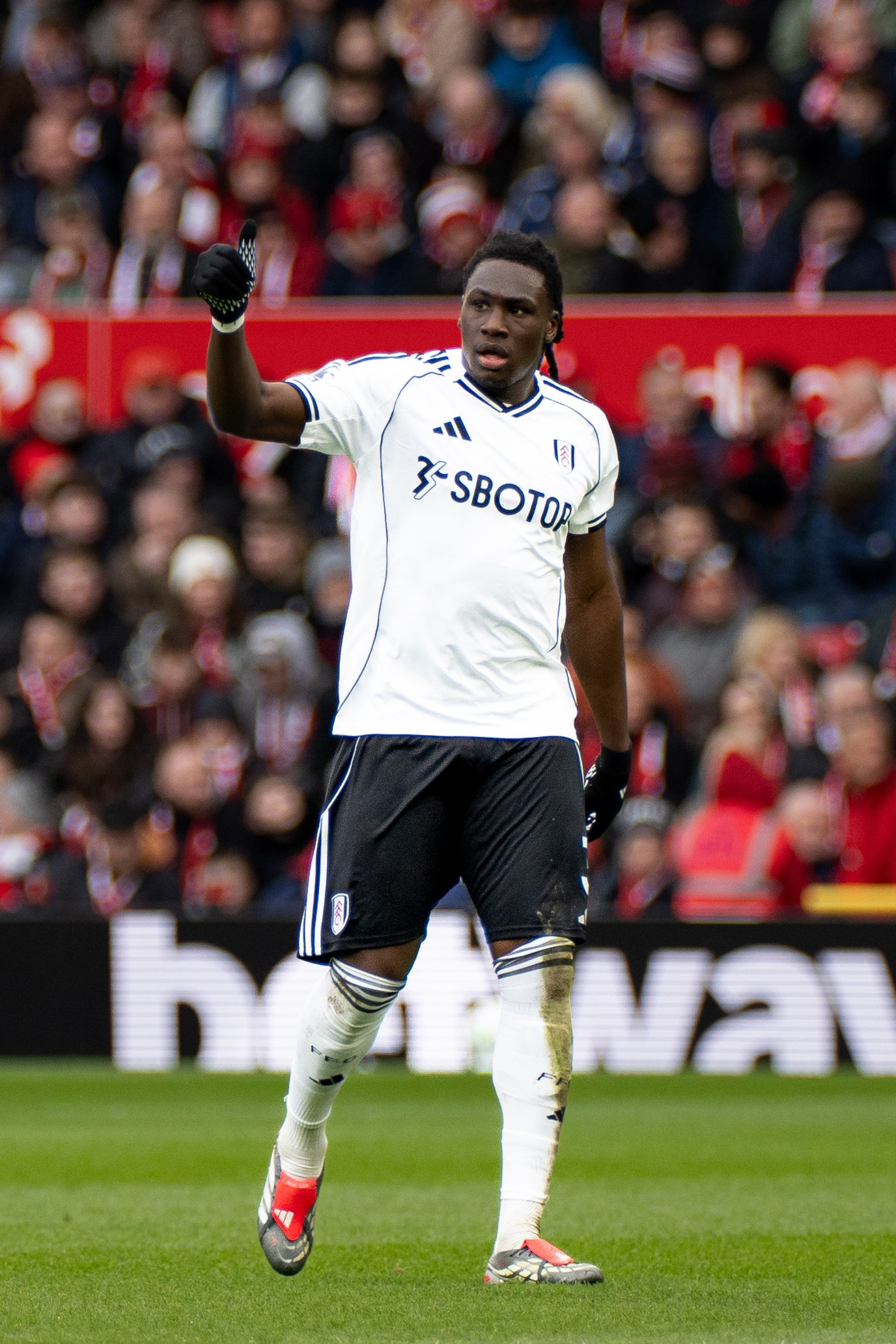 Fulham player controlling the ball during the Premier League match against Nottingham Forest