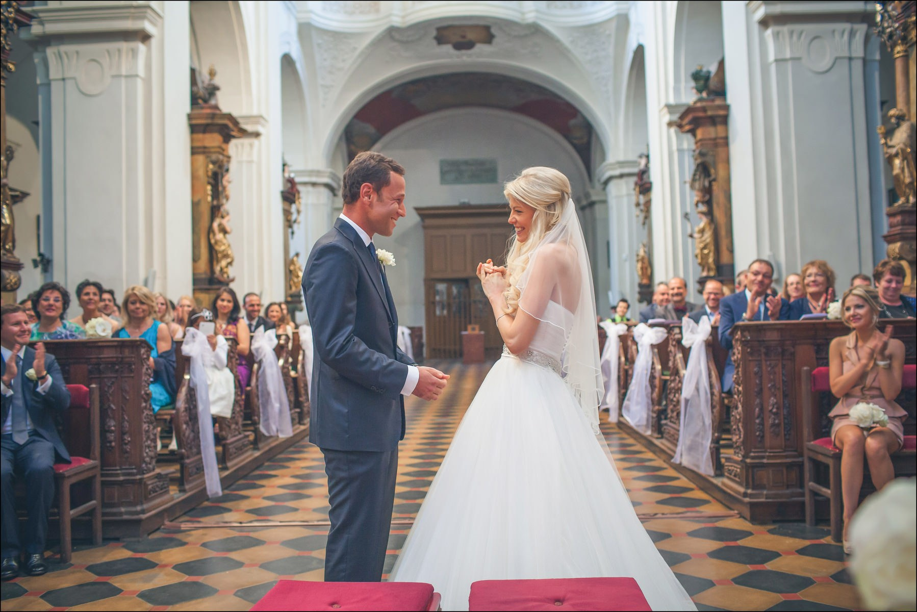 Emotional bride Julia in tears of joy after wedding kiss Prague
