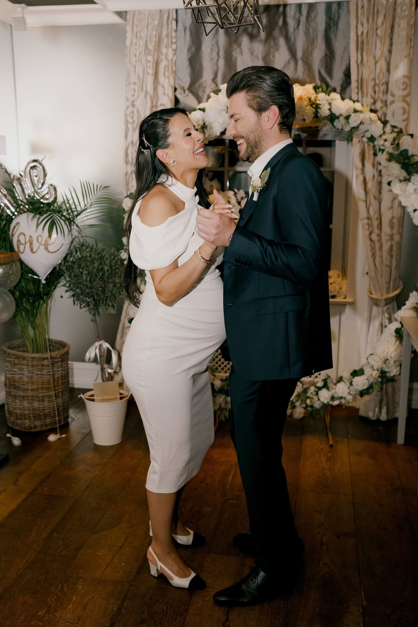 Couple dancing indoors at Käfer Stammhaus in Munich