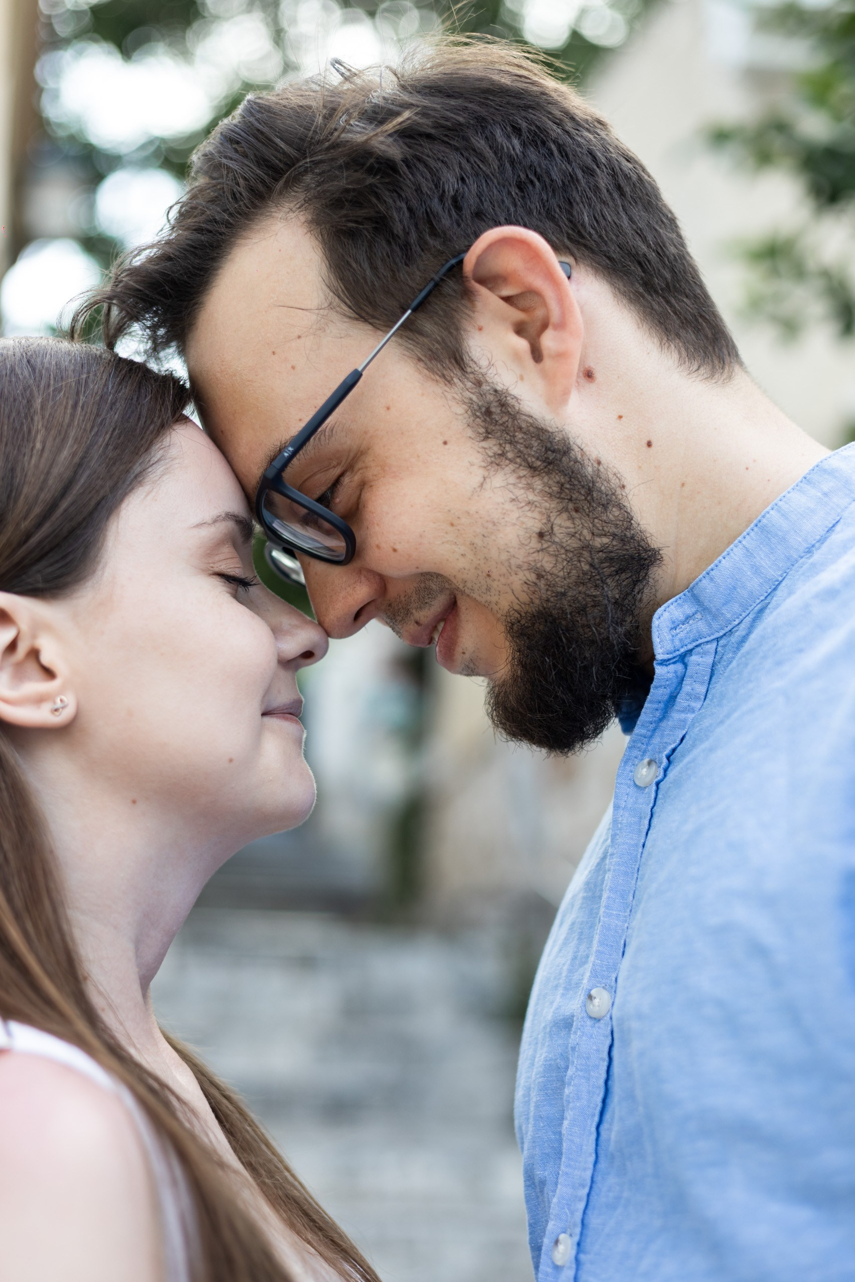 Couple embracing in a quiet street in Athens
