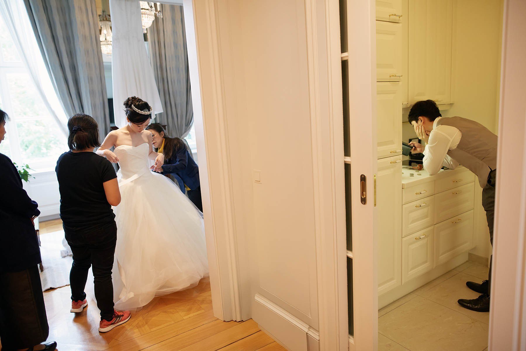 All the while, the nervous groom is checking his social media feeds oblivious to his young bride being frantically prepped.