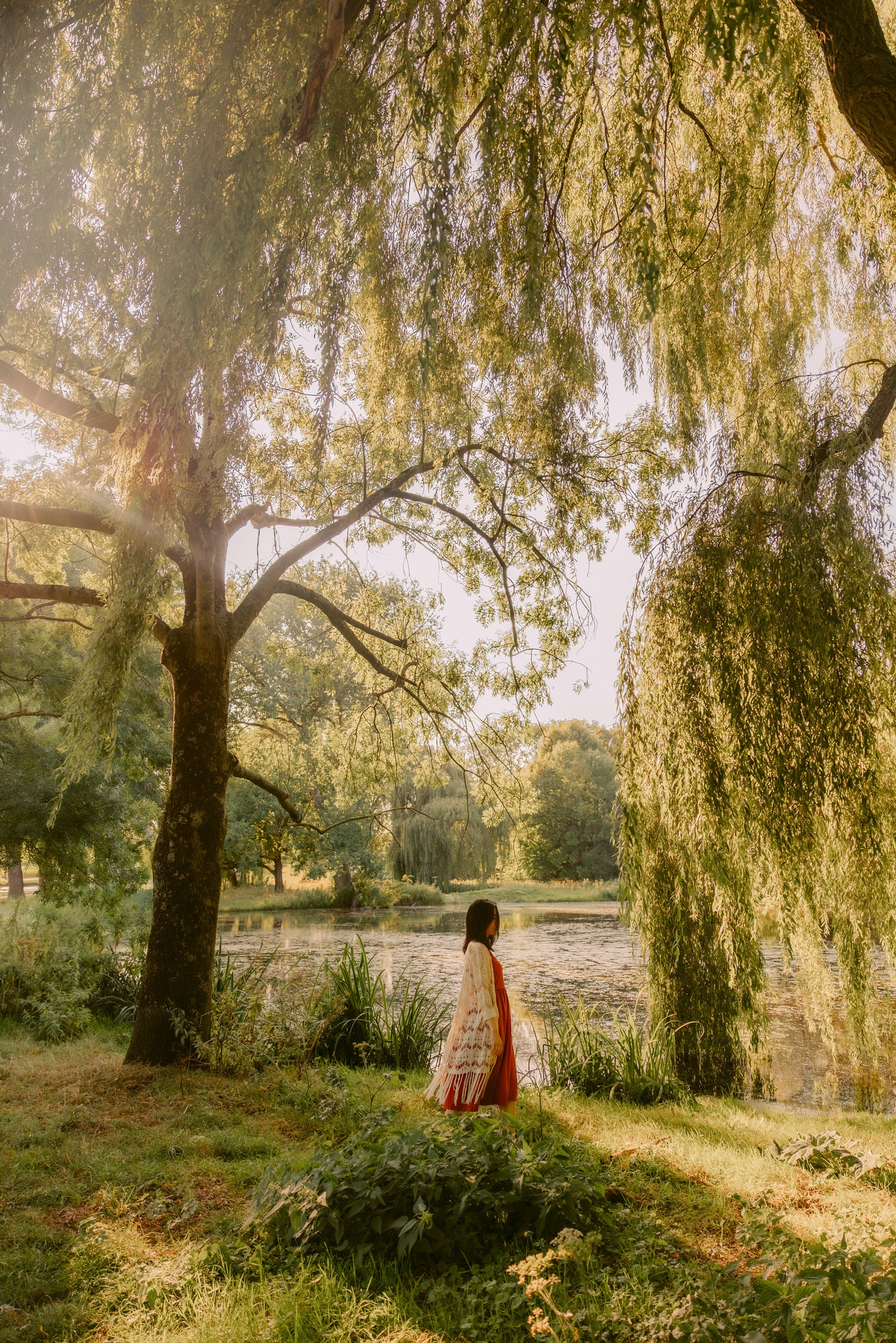 Red Dress Photoshoot in Kralingse Bos, Rotterdam — Portraits by the Lake. Romantic & Soulful Photography by Natalia Olhova in Rotterdam