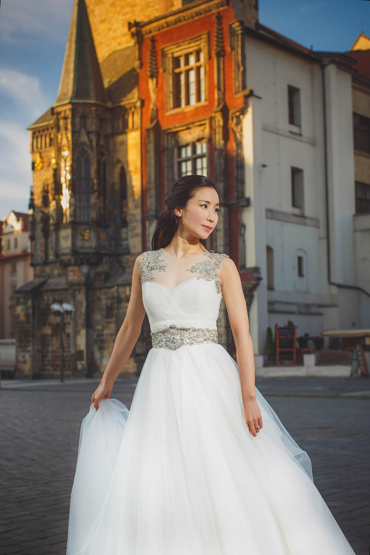 Catherine wedding dress Old Town Square golden sun Prague portrait.