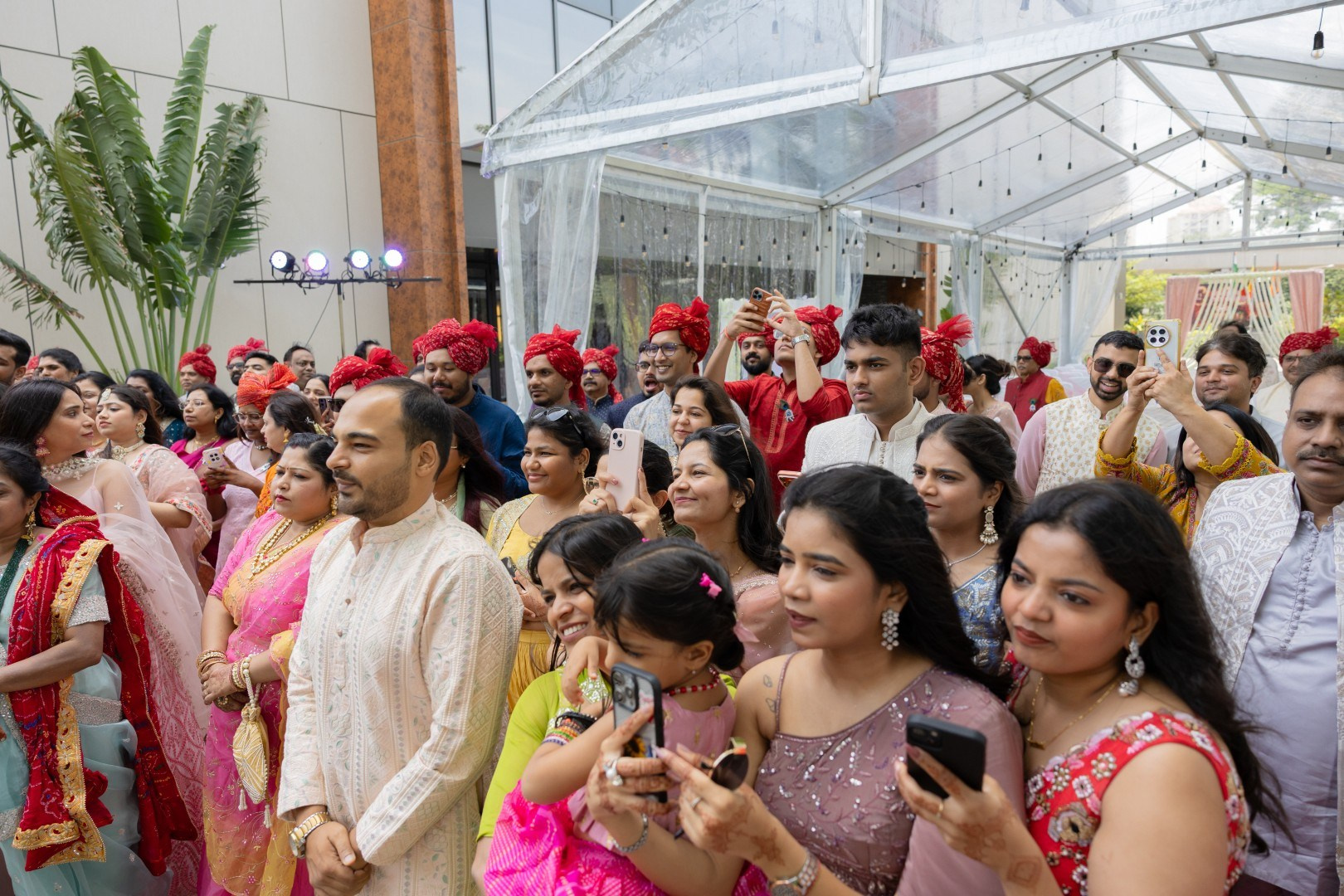 Hands in the Air: Chiranjeev & Niharika at Hyatt Centric Hebbal. Truly Yours | Documentary Wedding Photography & Films | Sharath Padaru, Bangalore