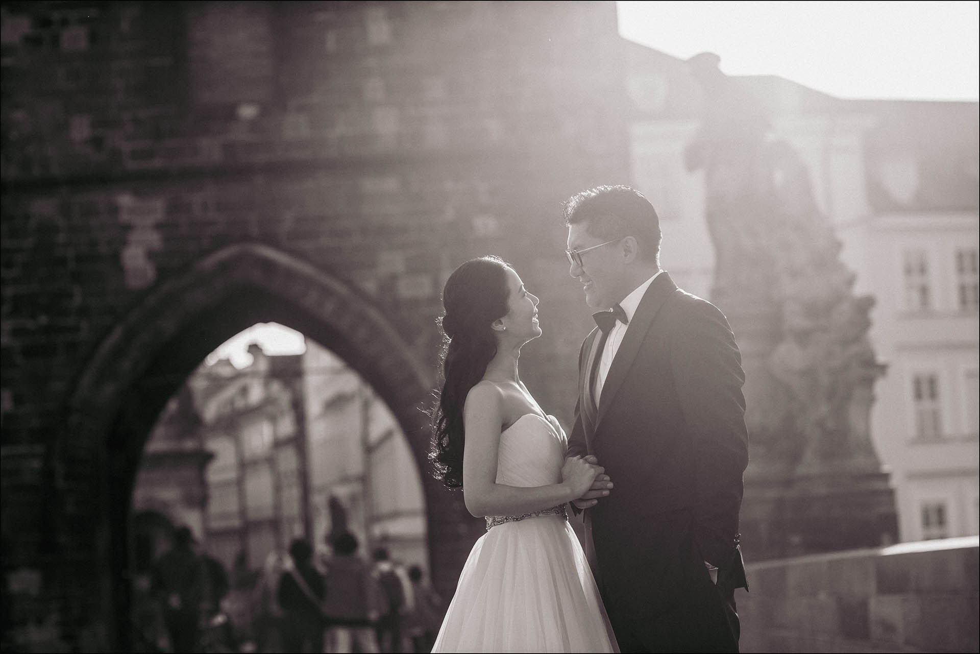 Catherine Cedric Son monochrome Charles Bridge sunrise portrait.