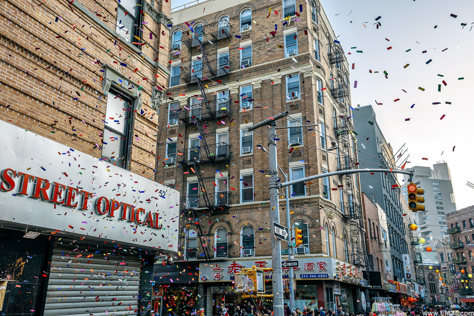 Lunar New Year Chinatown Street Photography — Chaotic NYC Festival Captured in One Hour of Firecrackers, Color & Energy. Emin Kuliyev — Award-Winning Wedding Photojournalist NYC & USA | Best Wedding Photographer Known for Candid, Timeless Moments