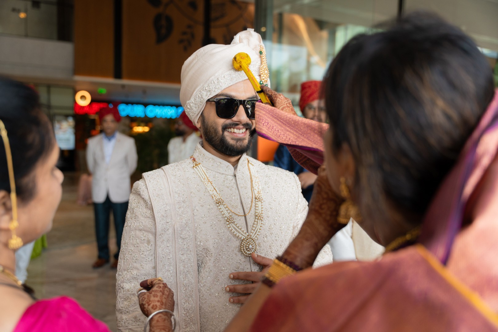 Hands in the Air: Chiranjeev & Niharika at Hyatt Centric Hebbal. Truly Yours | Documentary Wedding Photography & Films | Sharath Padaru, Bangalore