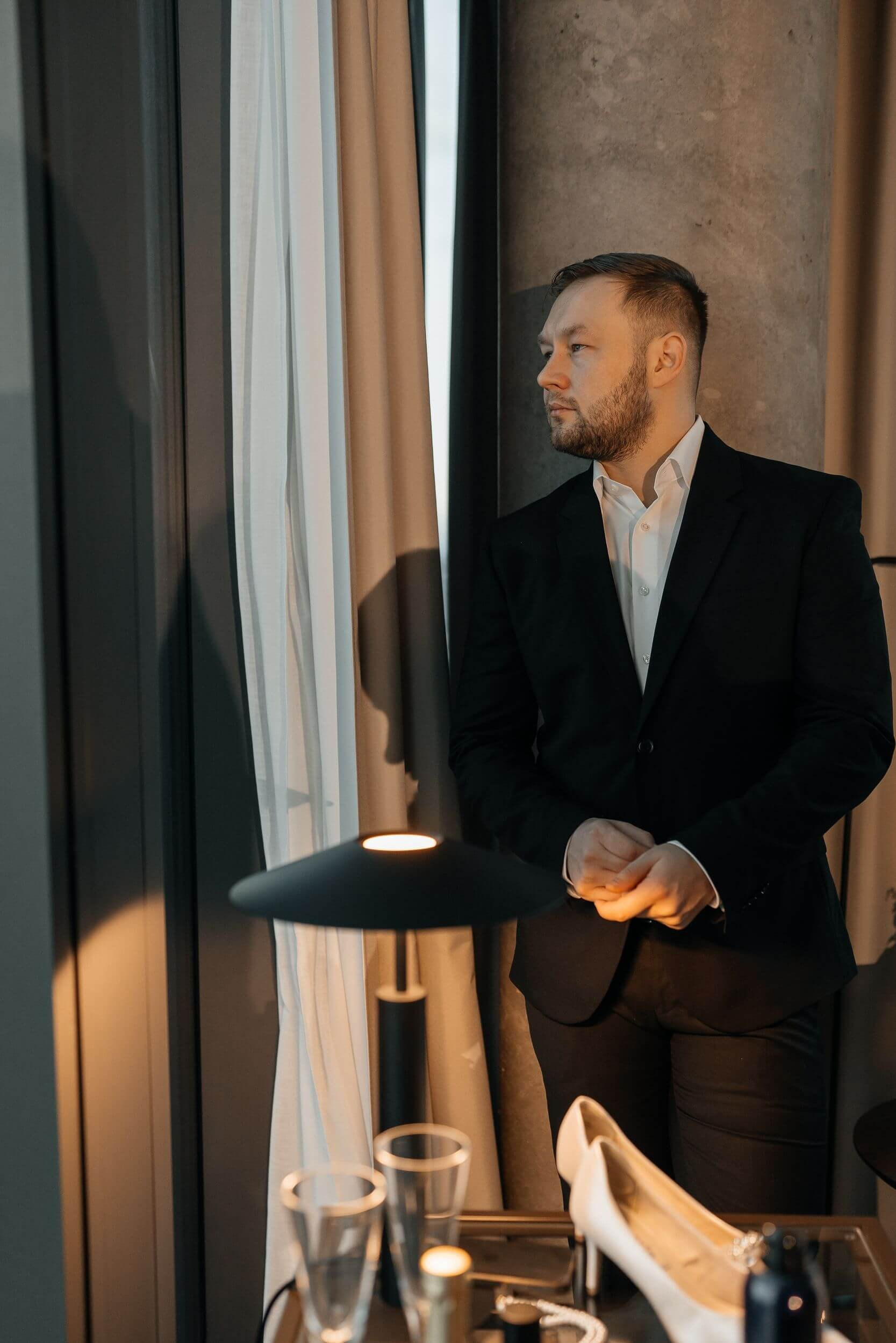 groom portrait at hotel