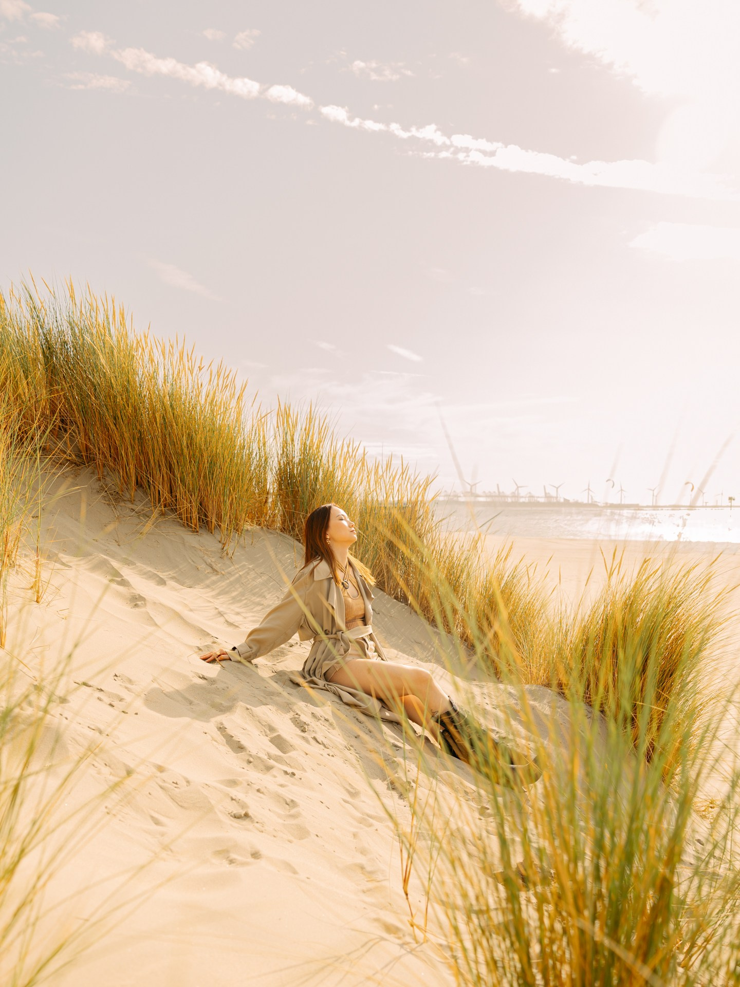In the Dunes — Portrait Photoshoot on the Dutch Coast. Romantic & Soulful Photography by Natalia Olhova in Rotterdam