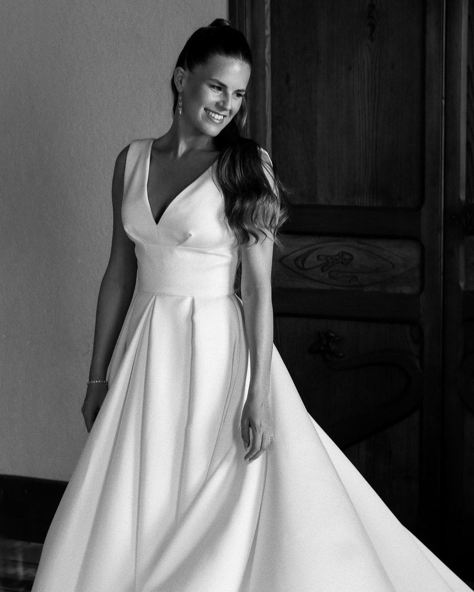 Bride smiling in her wedding dress before her ceremony at Alqueria Blanca, Mallorca