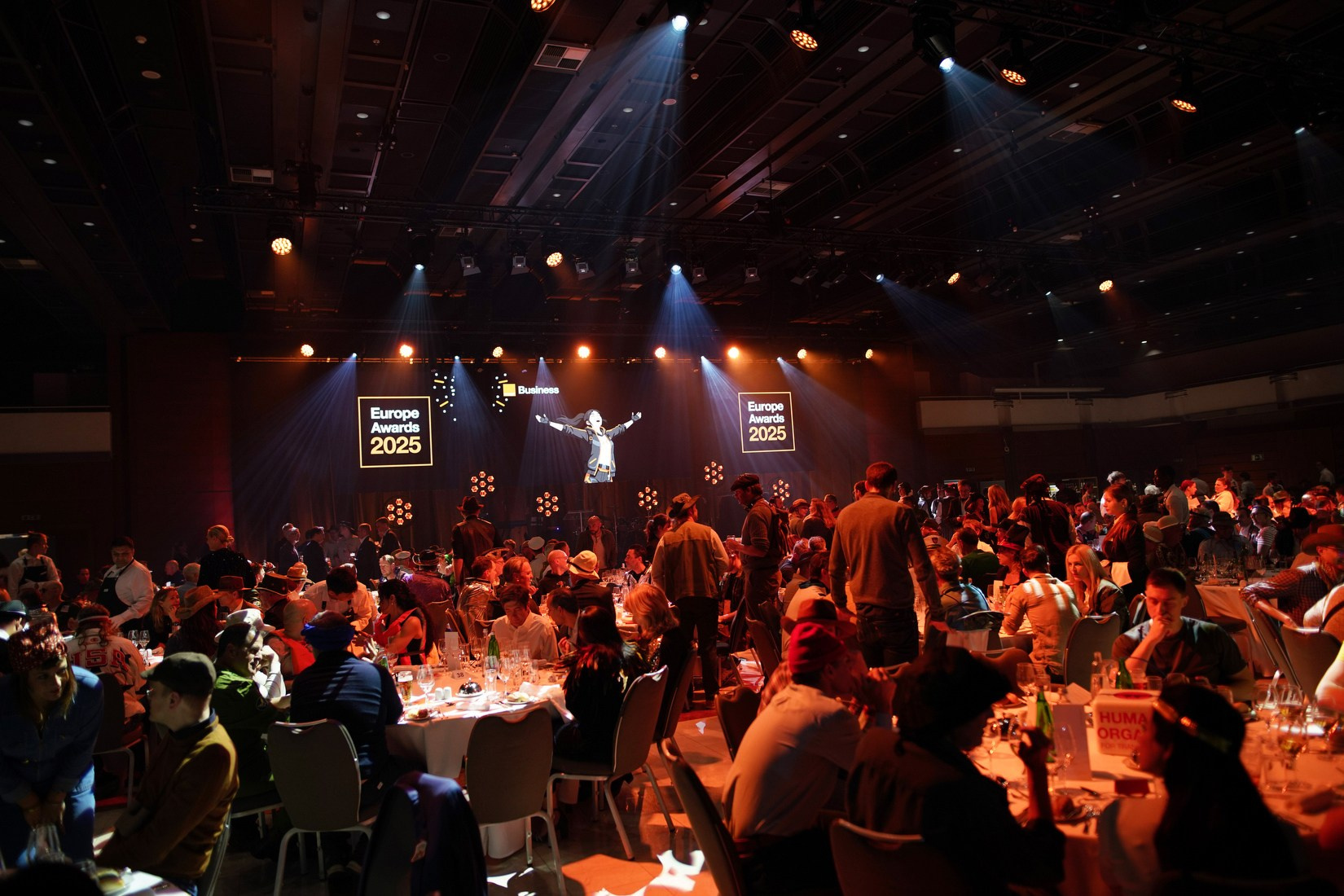 Delegates seating for awards gala dinner at Orange Business European Sales Kick-Off 2026, Hilton Prague.