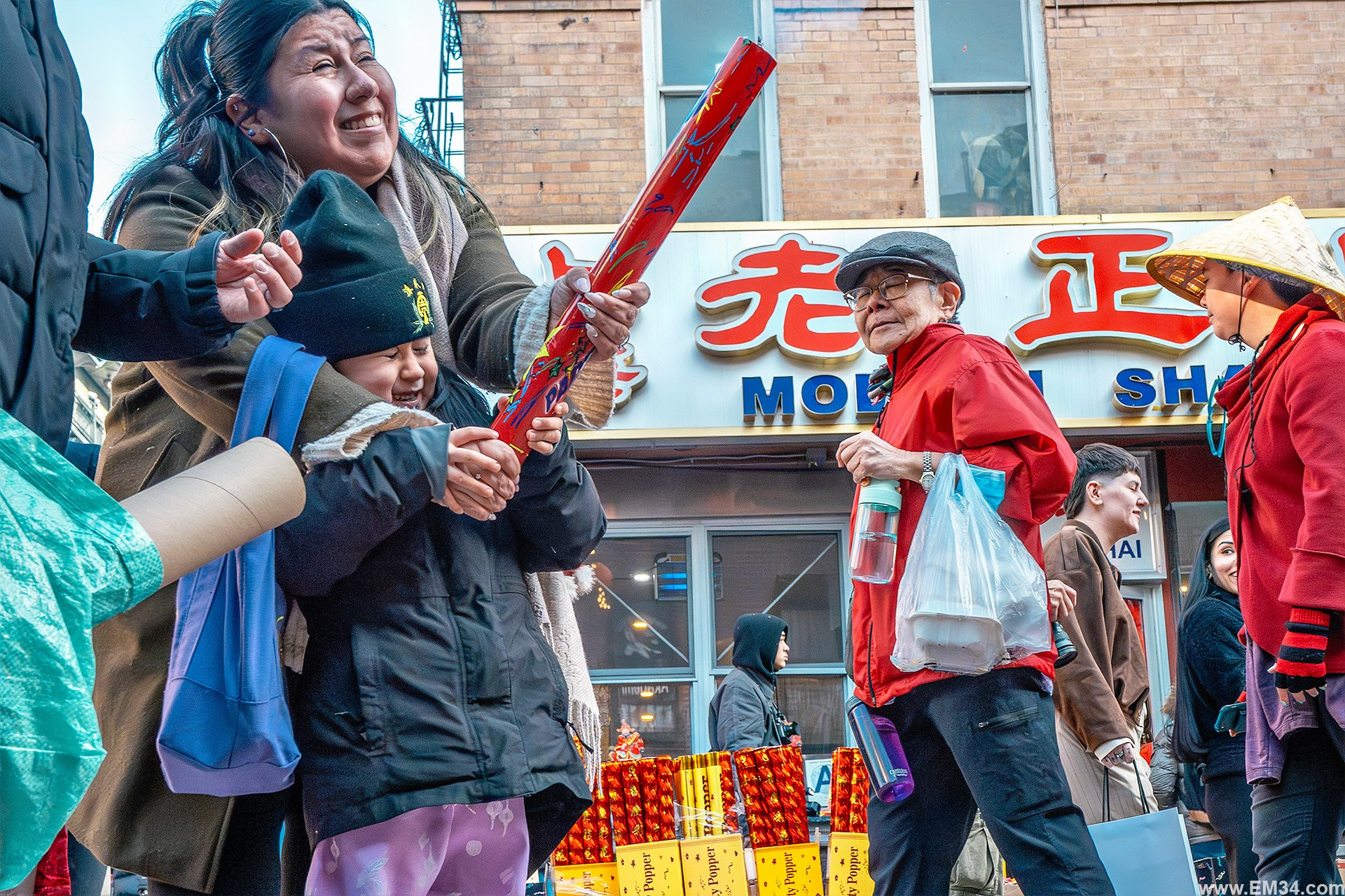 Lunar New Year Chinatown Street Photography — Chaotic NYC Festival Captured in One Hour of Firecrackers, Color & Energy. Emin Kuliyev — Award-Winning Wedding Photojournalist NYC & USA | Best Wedding Photographer Known for Candid, Timeless Moments