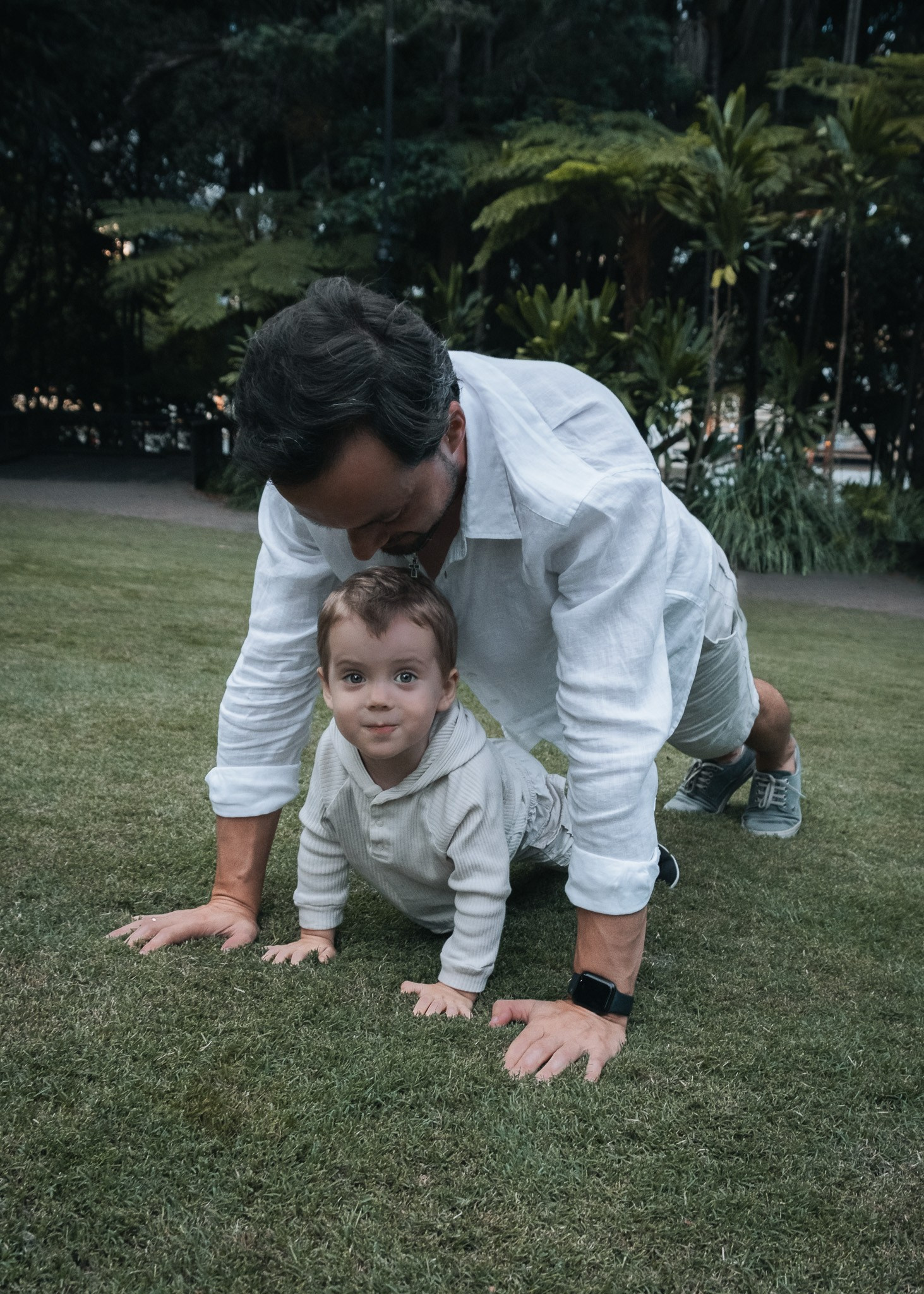 Happy family photo session in Brisbane park, candid lifestyle photography.