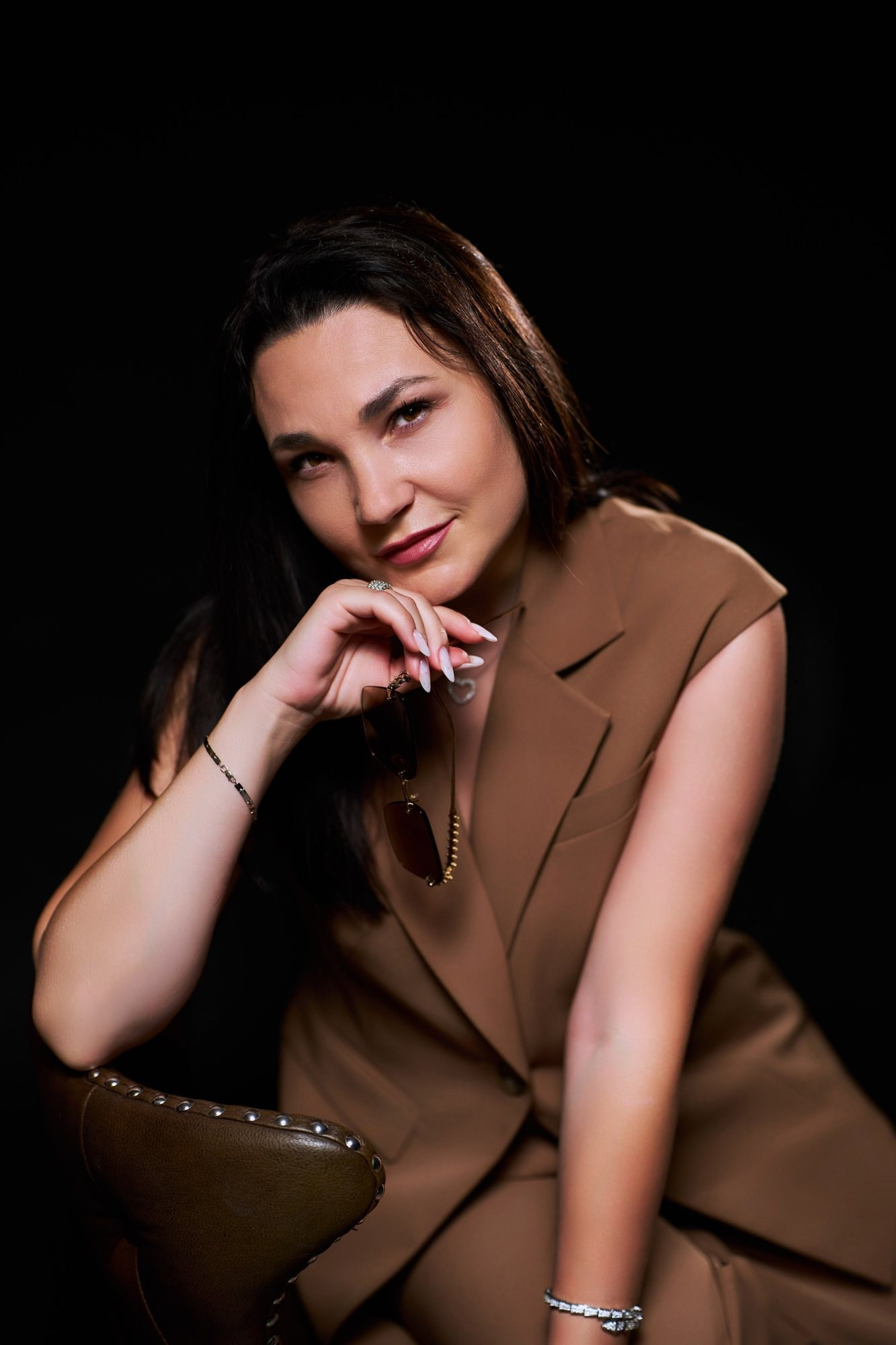 Personal branding photoshoot Miami — woman in a beige suit, studio portrait