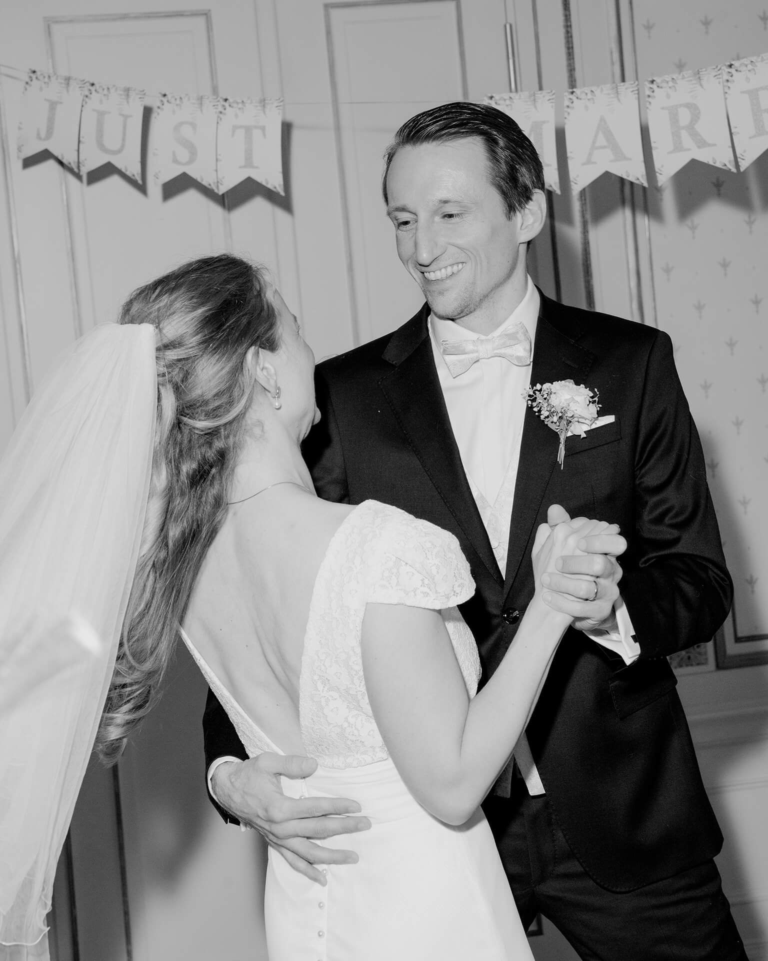 Black and white couple dancing, reception moment at Falkenstein Grand
