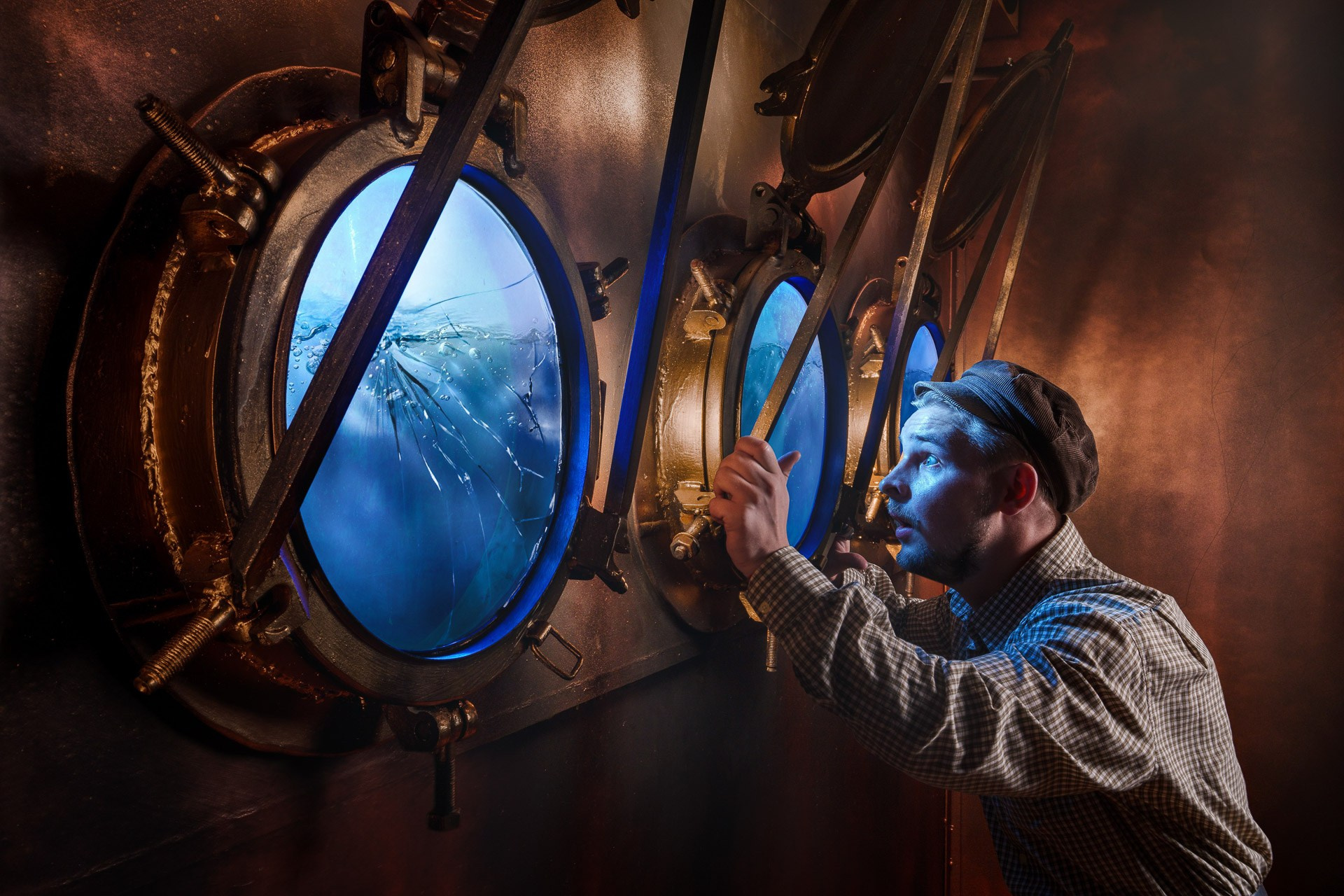 Lifestyle portrait inside industrial interior with round windows, cinematic light