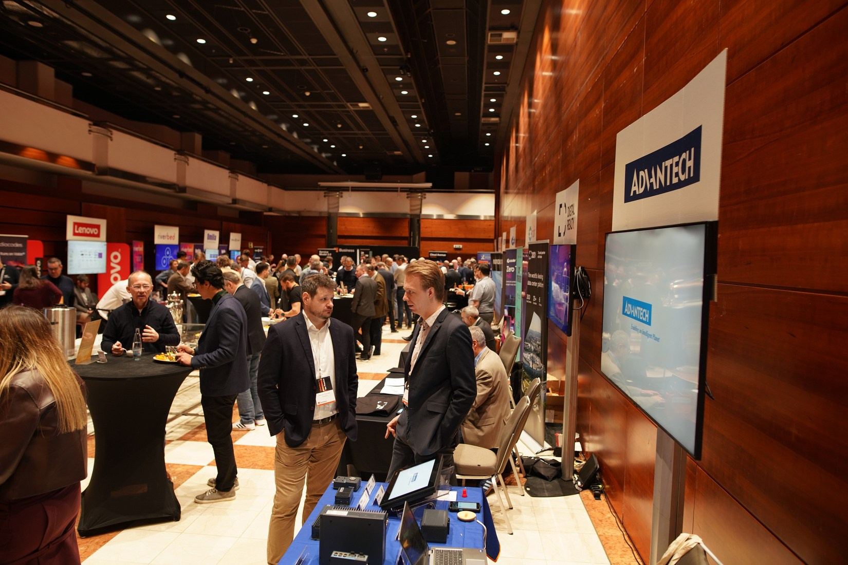 Wide-angle view of 600+ delegates and exhibition stands at Orange Business Sales Kick-Off 2026, Hilton Prague corporate event.