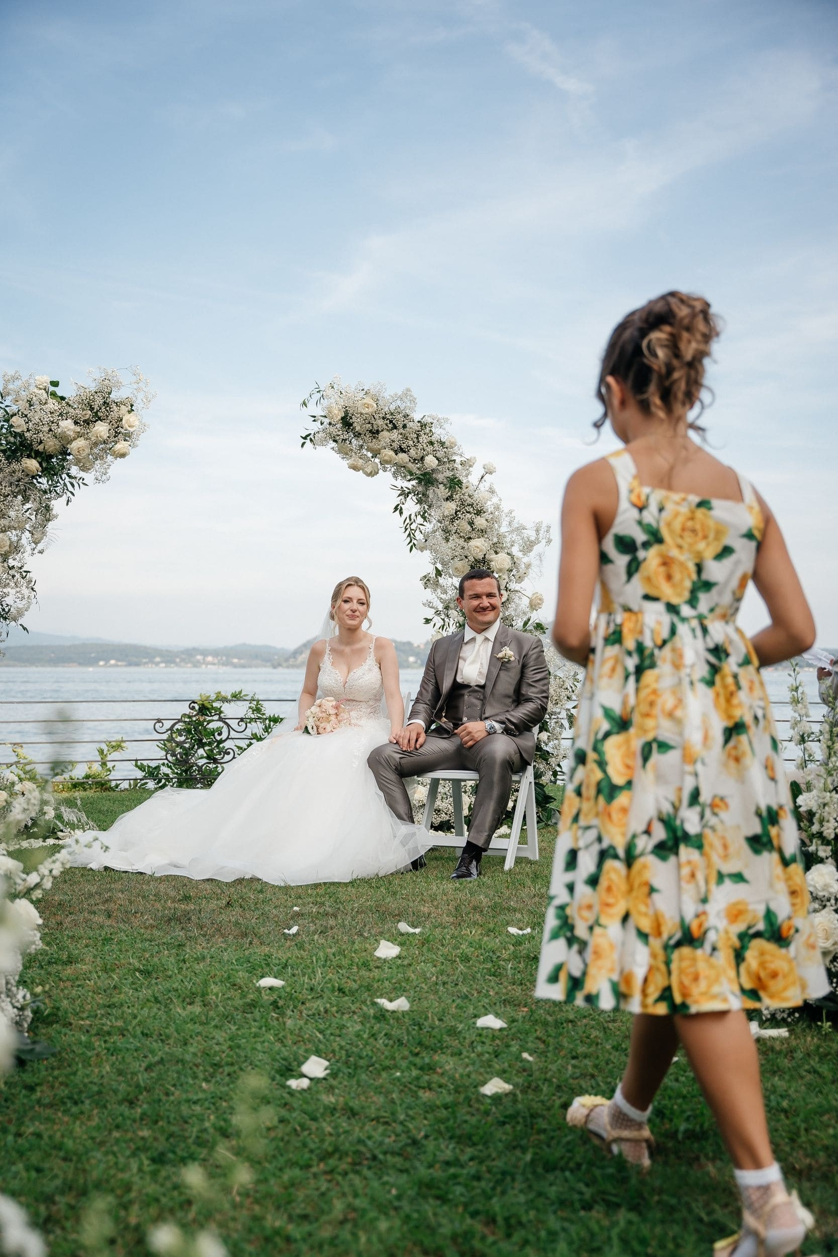 sister is bringing the rings to the couple