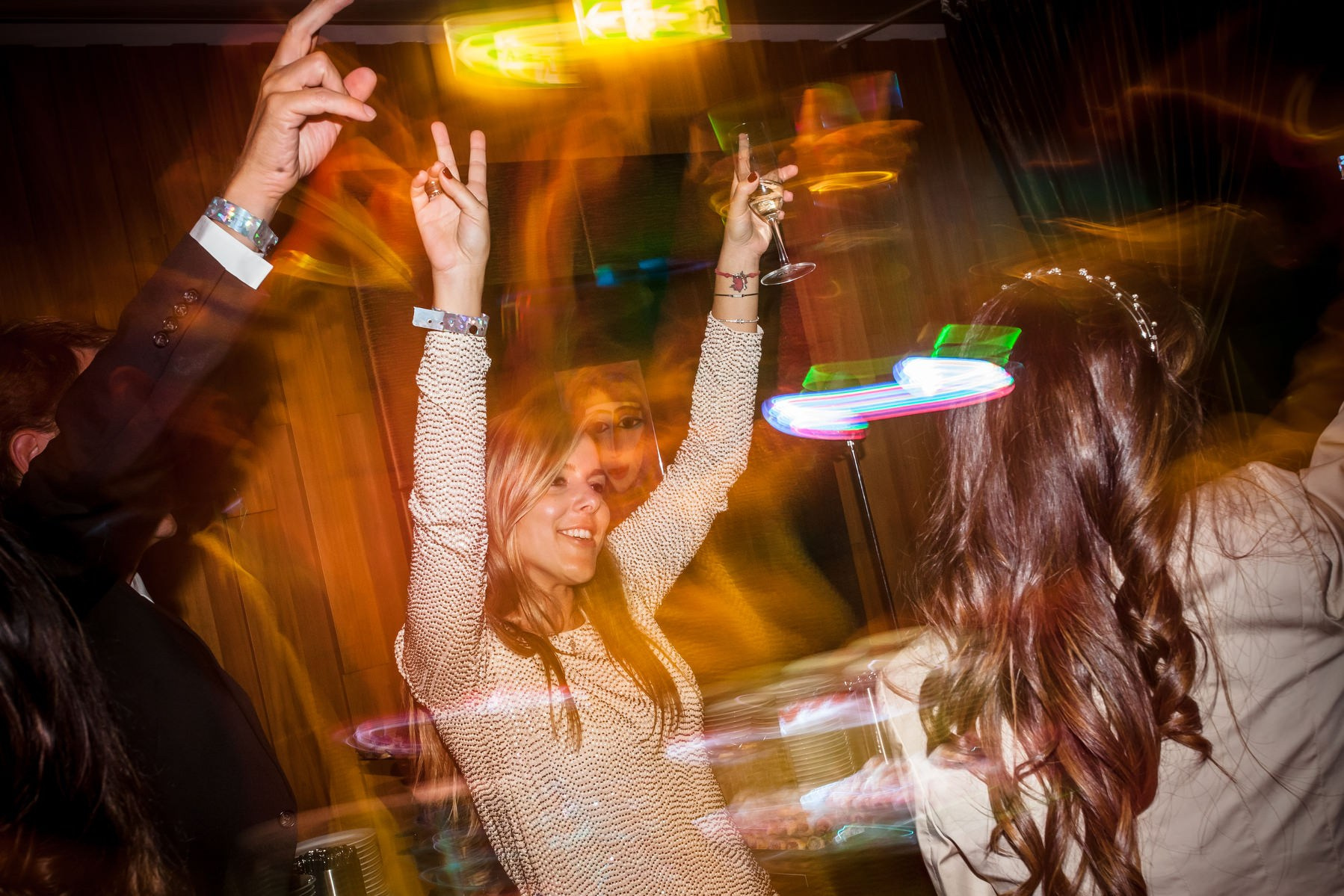 Guest celebrating arms up music moment Sky Bar Prague