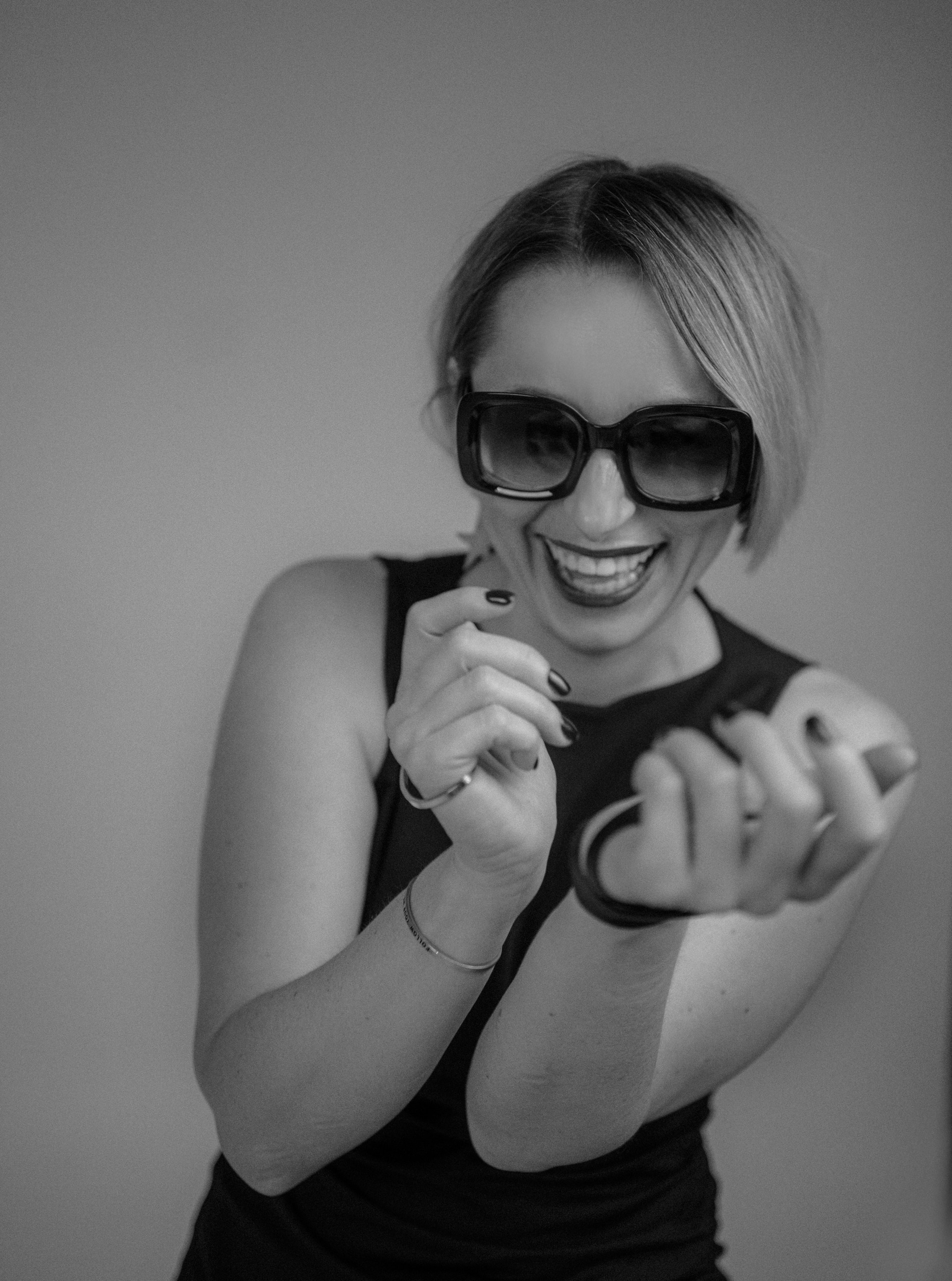 Creative female portrait in black and white tones, with soft shadows, Riga portrait photographer